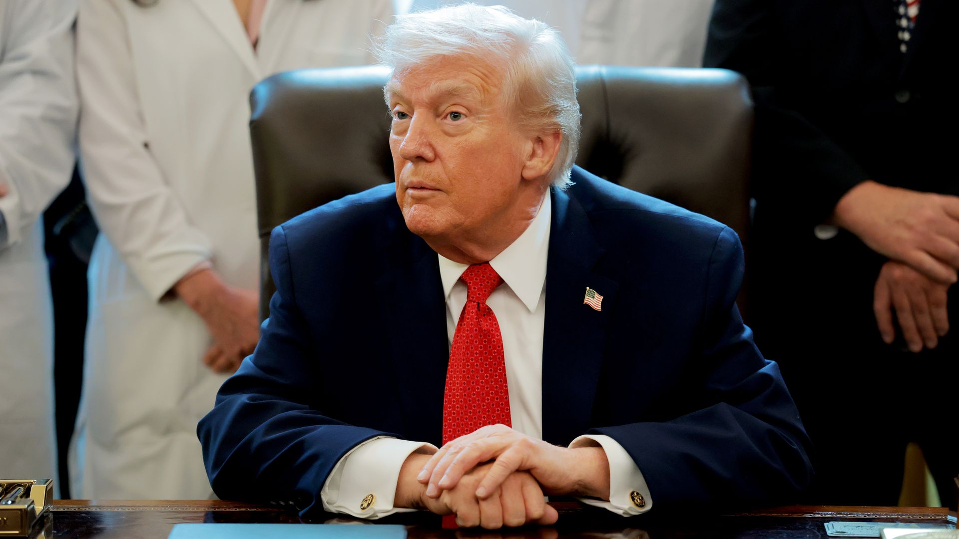 President Donald Trump addresses reporters in the Oval Office after signing an executive order changing marijuana’s federal classification to Schedule III.