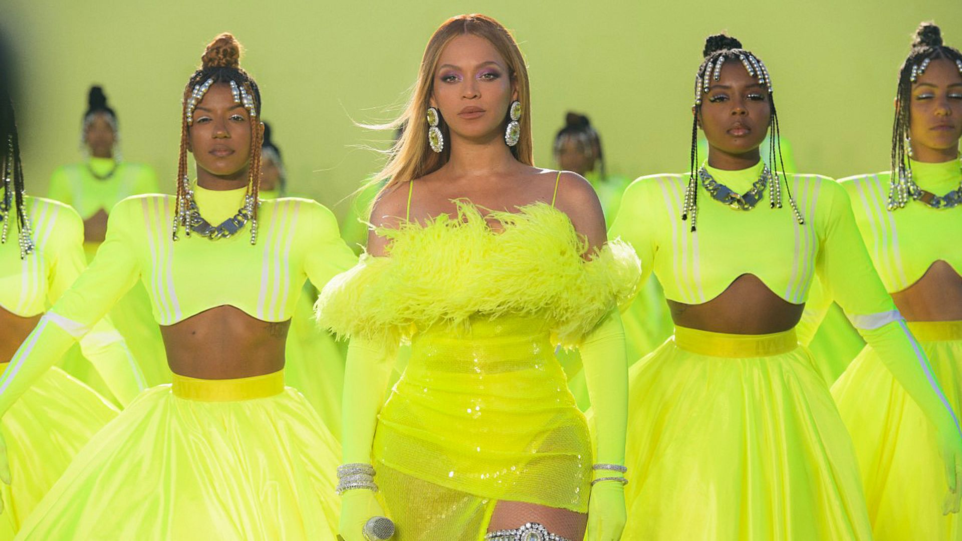 Beyoncé performs in a lime green outfit