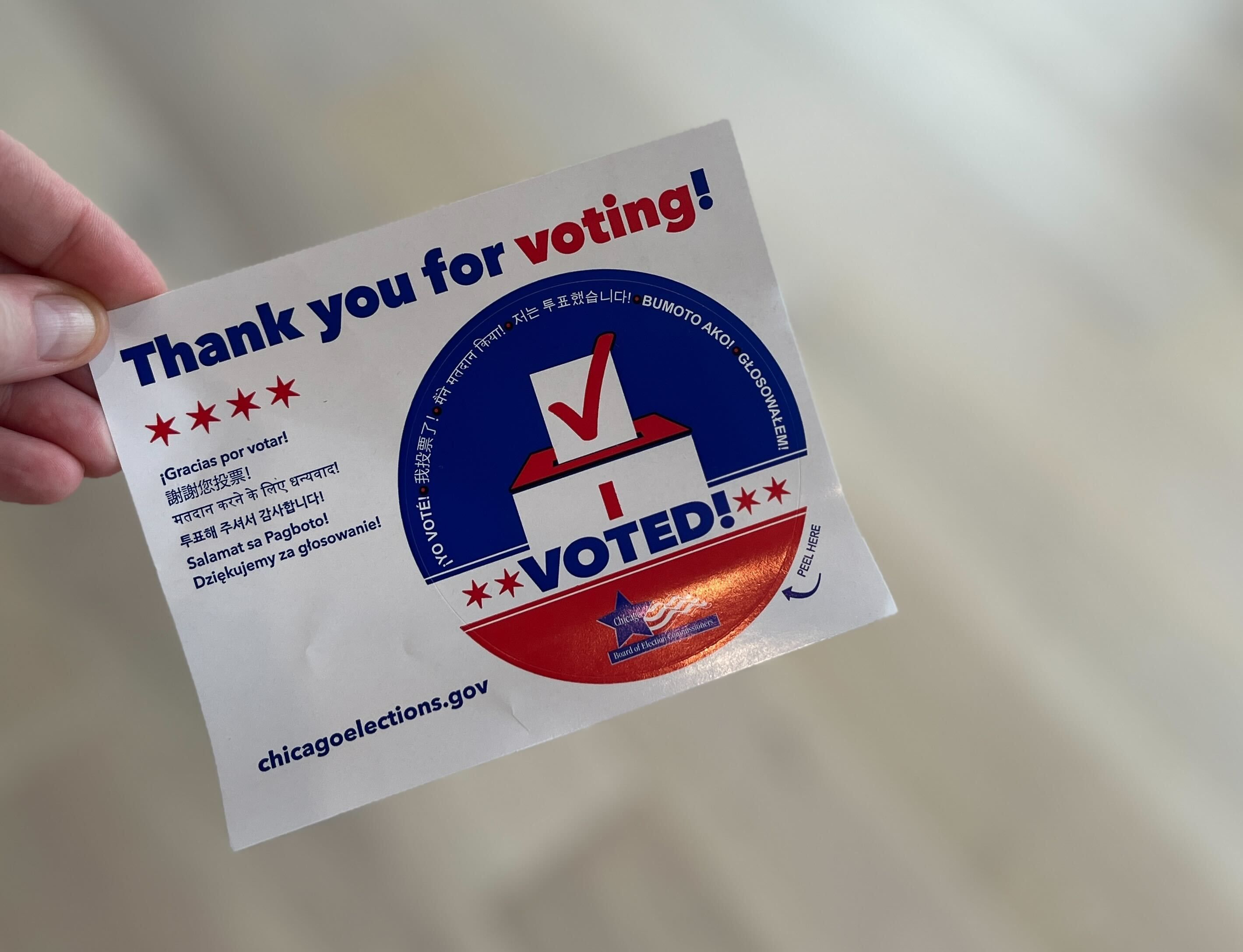 Photo shows an "I voted" sticker