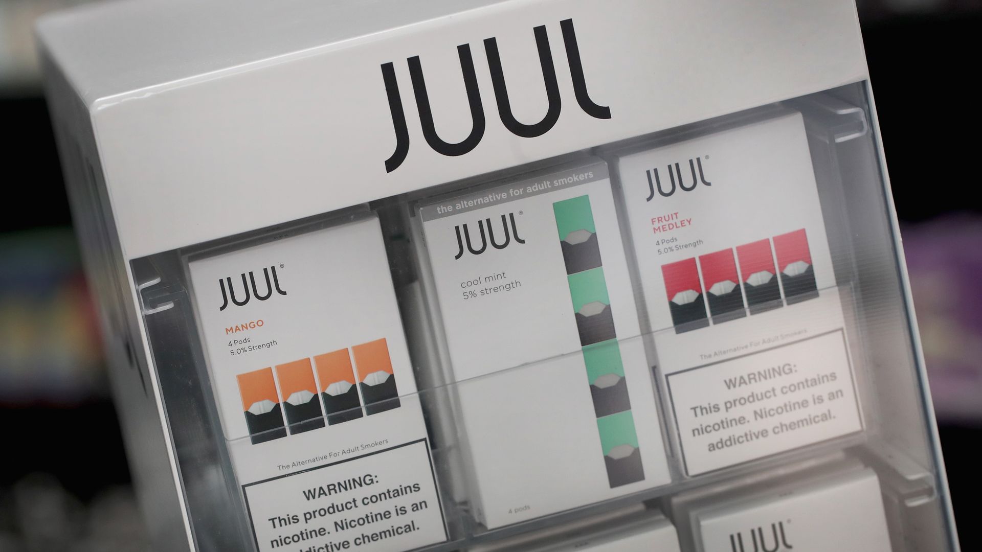 Electronic cigarettes and pods by Juul, the nation's largest maker of vaping products, are offered for sale at the Smoke Depot on September 13, 2018, in Chicago.