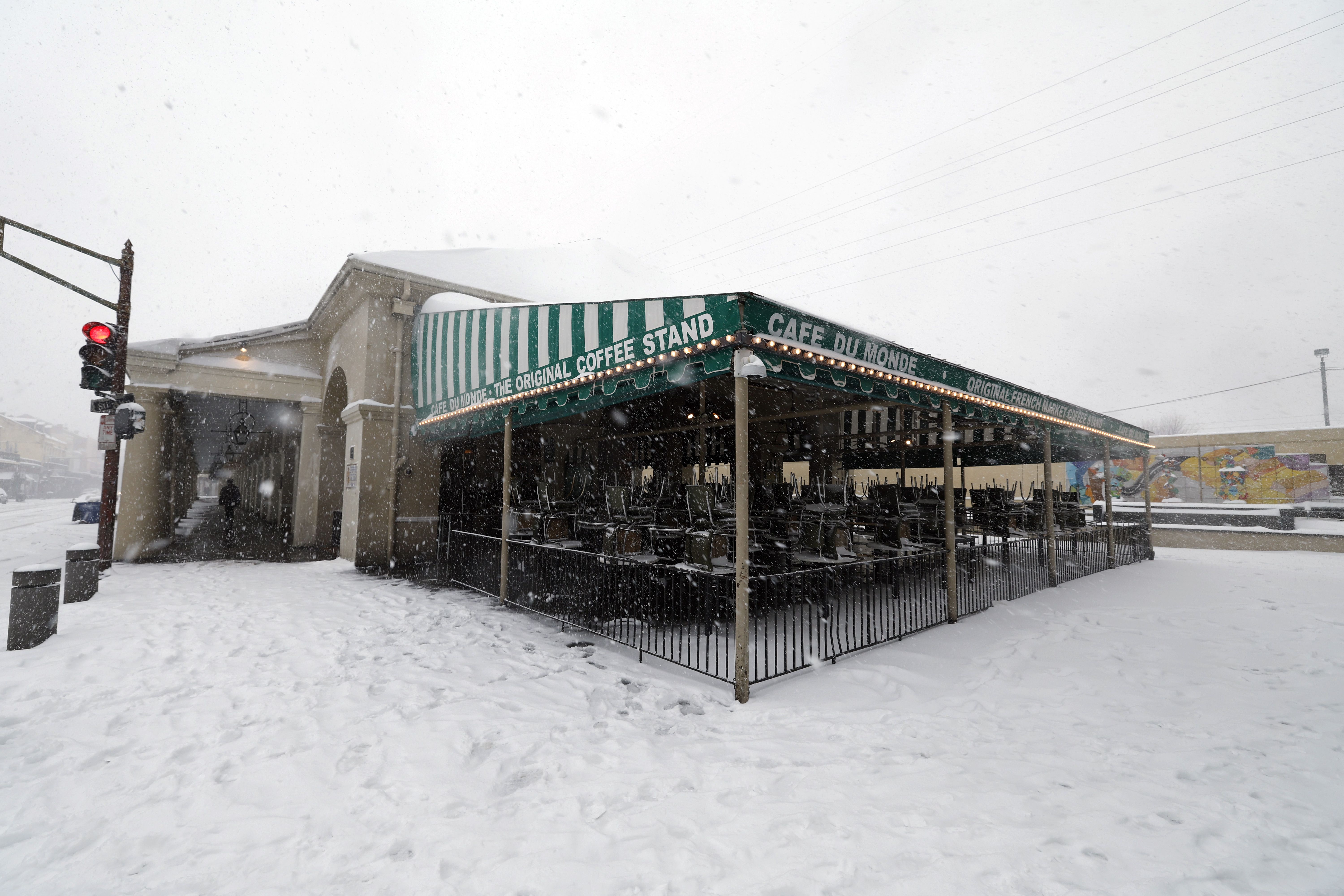 Photo shows Cafe Du Monde in the snow.