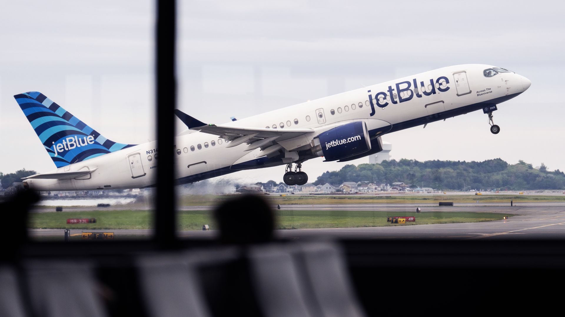 A JetBlue airplane takes off from Boston Logan International Airport on Monday, August 17, 2026.
