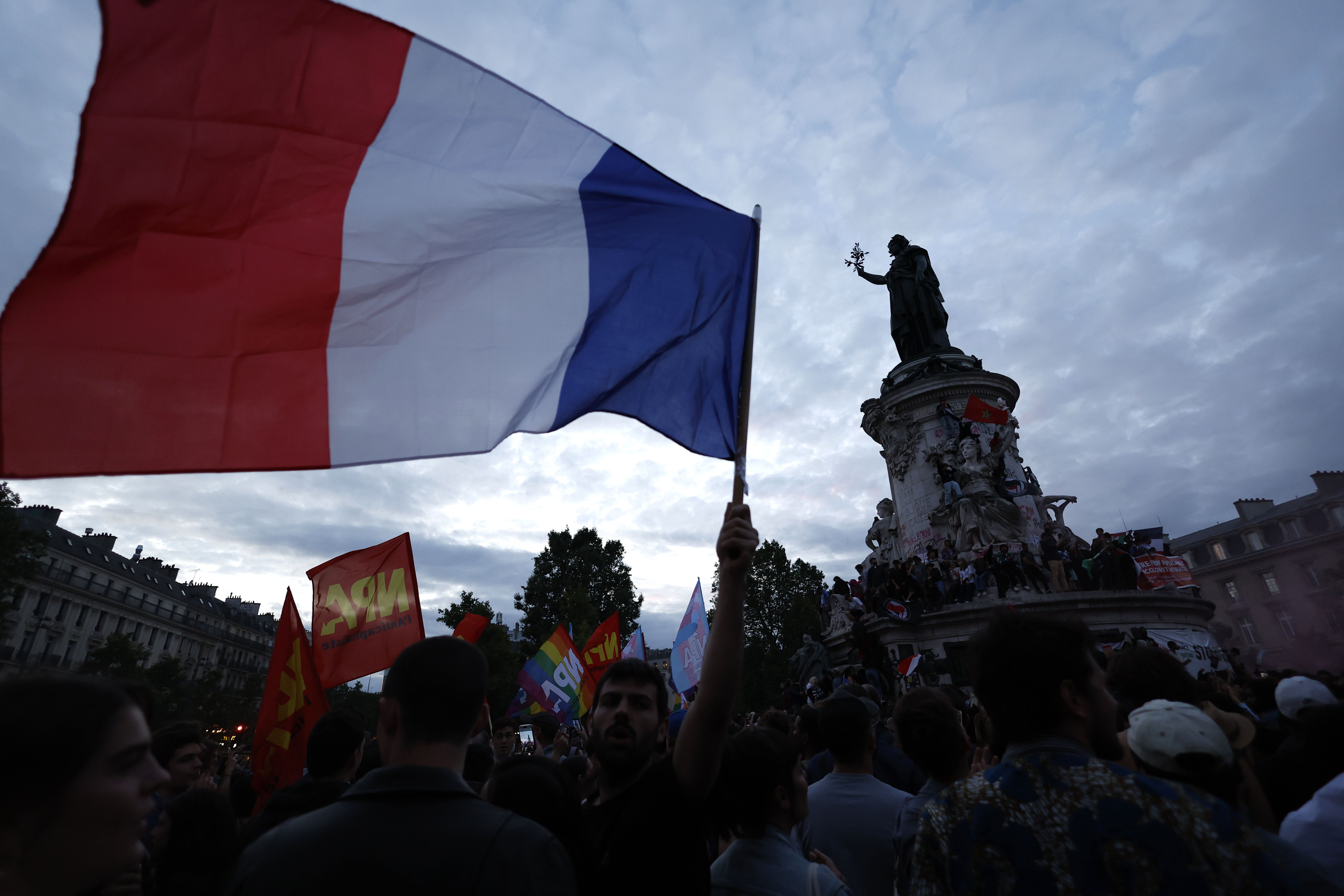 People gather on the Republique plaza after yesterday's legislative elections.