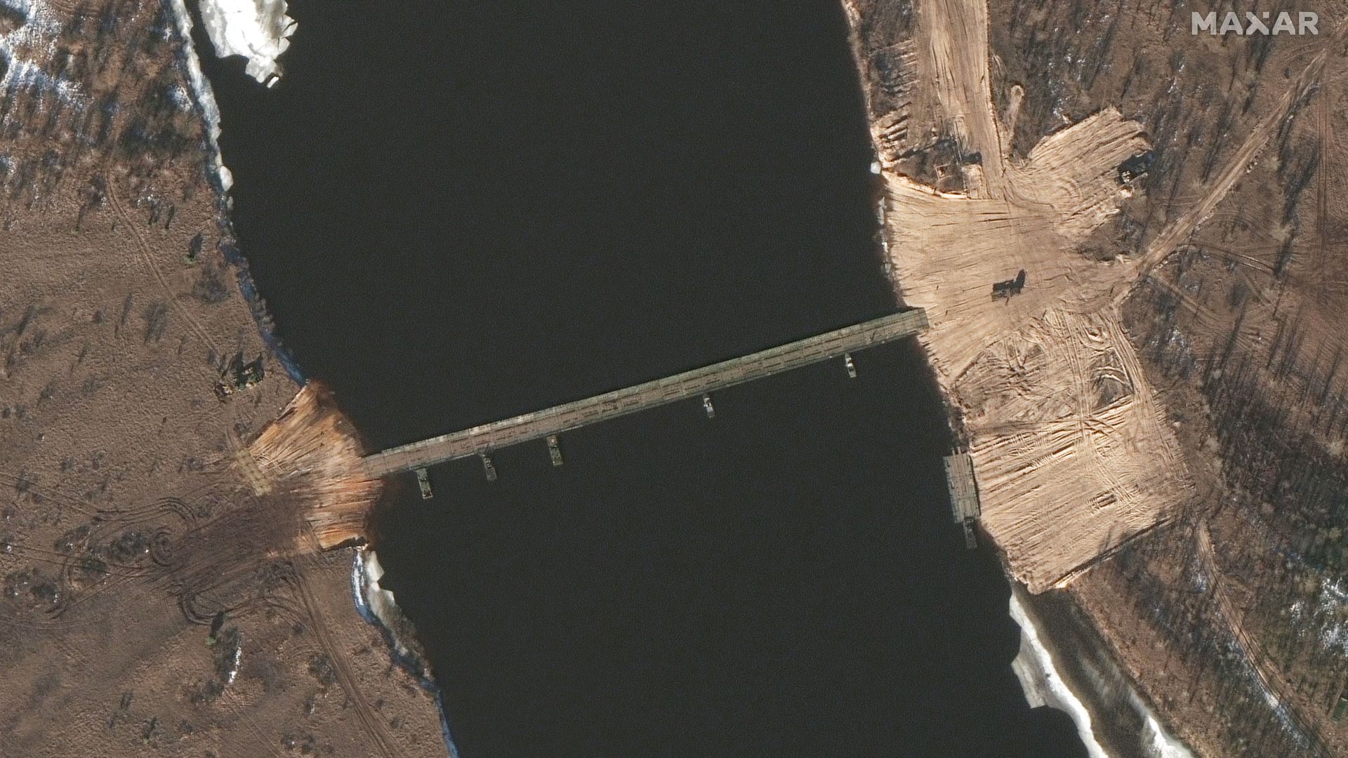 A satellite image of a new pontoon bridge crossing the Pripyat River build by Russia and Belarus captured on Feb. 16.