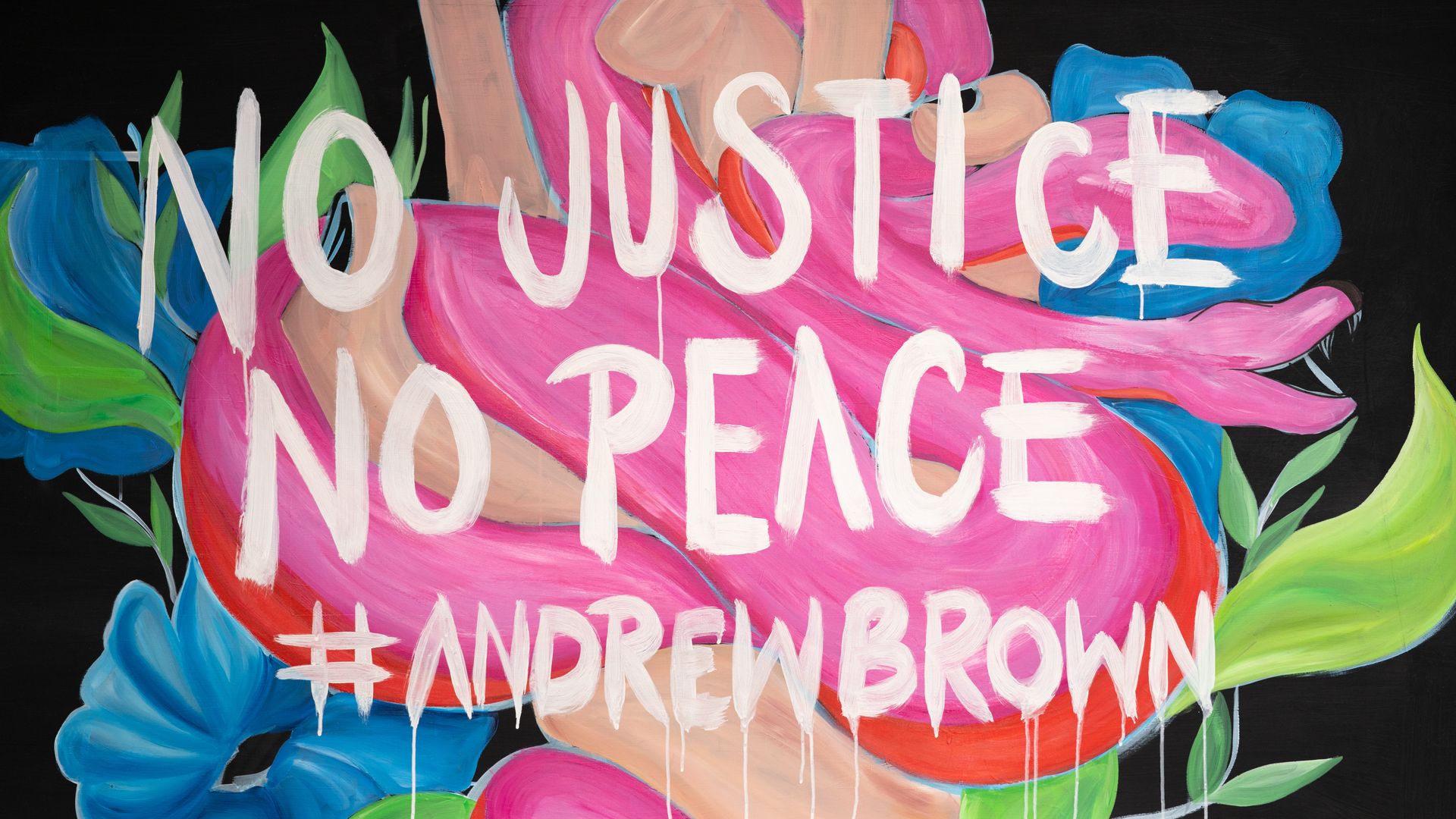 Picture of a mural that says "NO JUSTICE NO PEACE #ANDREWBROWN"