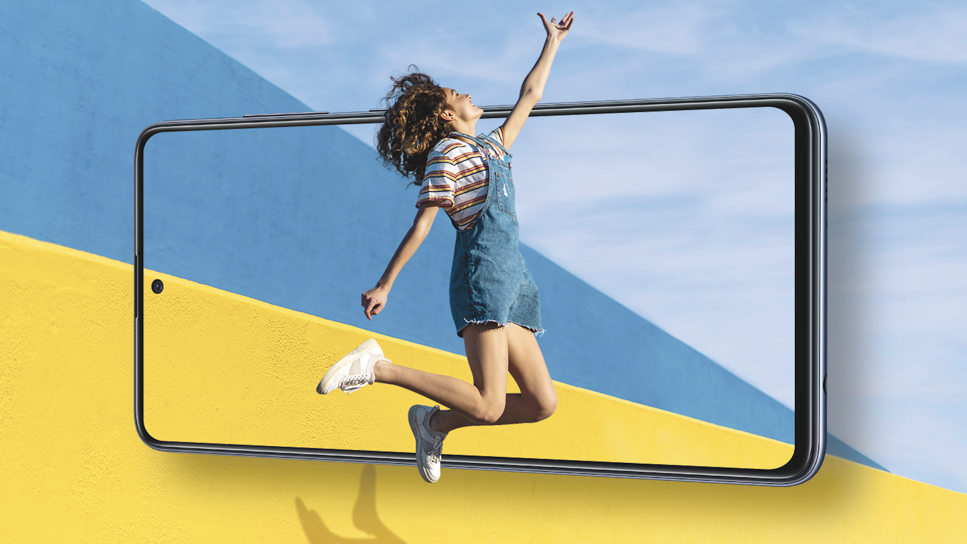 A photo illustration of the Galaxy A51 with a person chasing a red balloon against a colorful backdrop