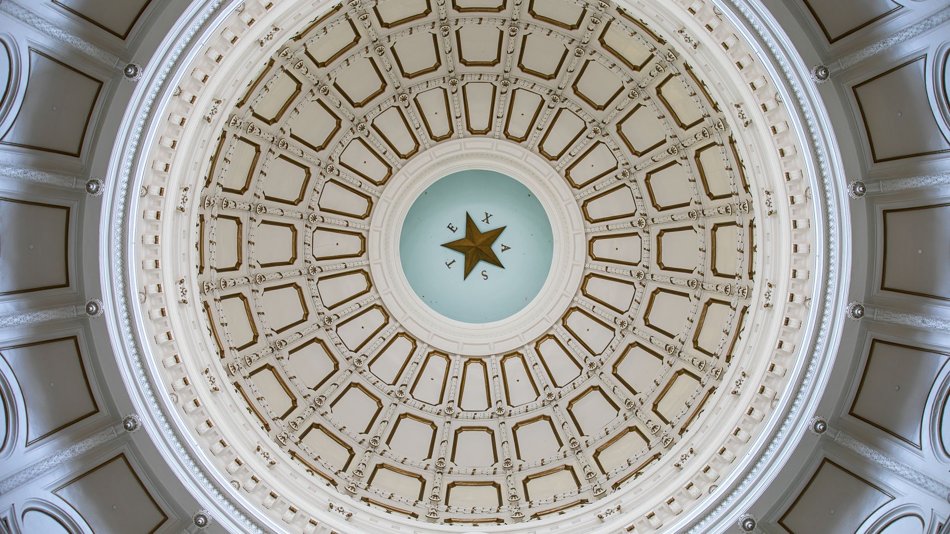Light shines through the Texas Capitol rotunda on July 13