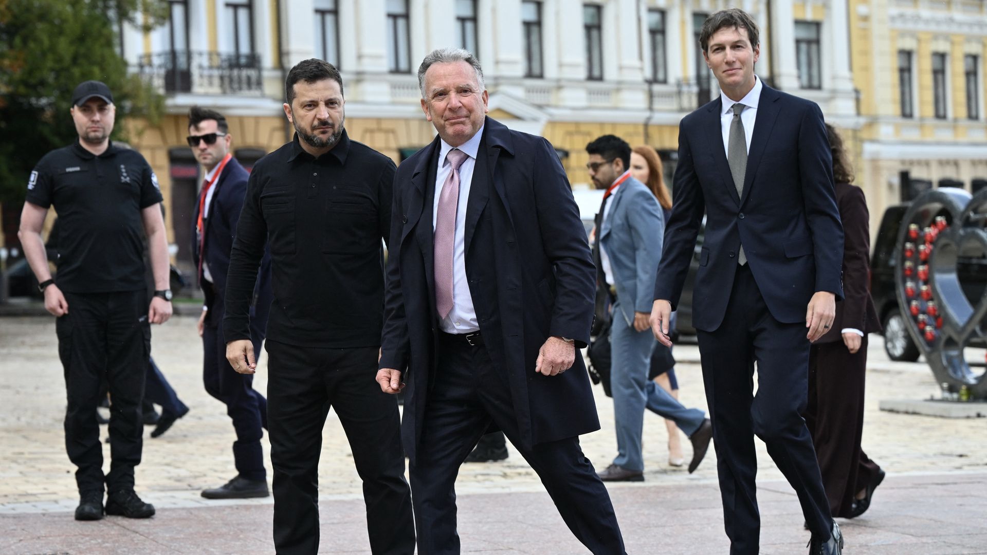 Zelensky walks alongside Witkoff and Kushner outside a government building in Kyiv.