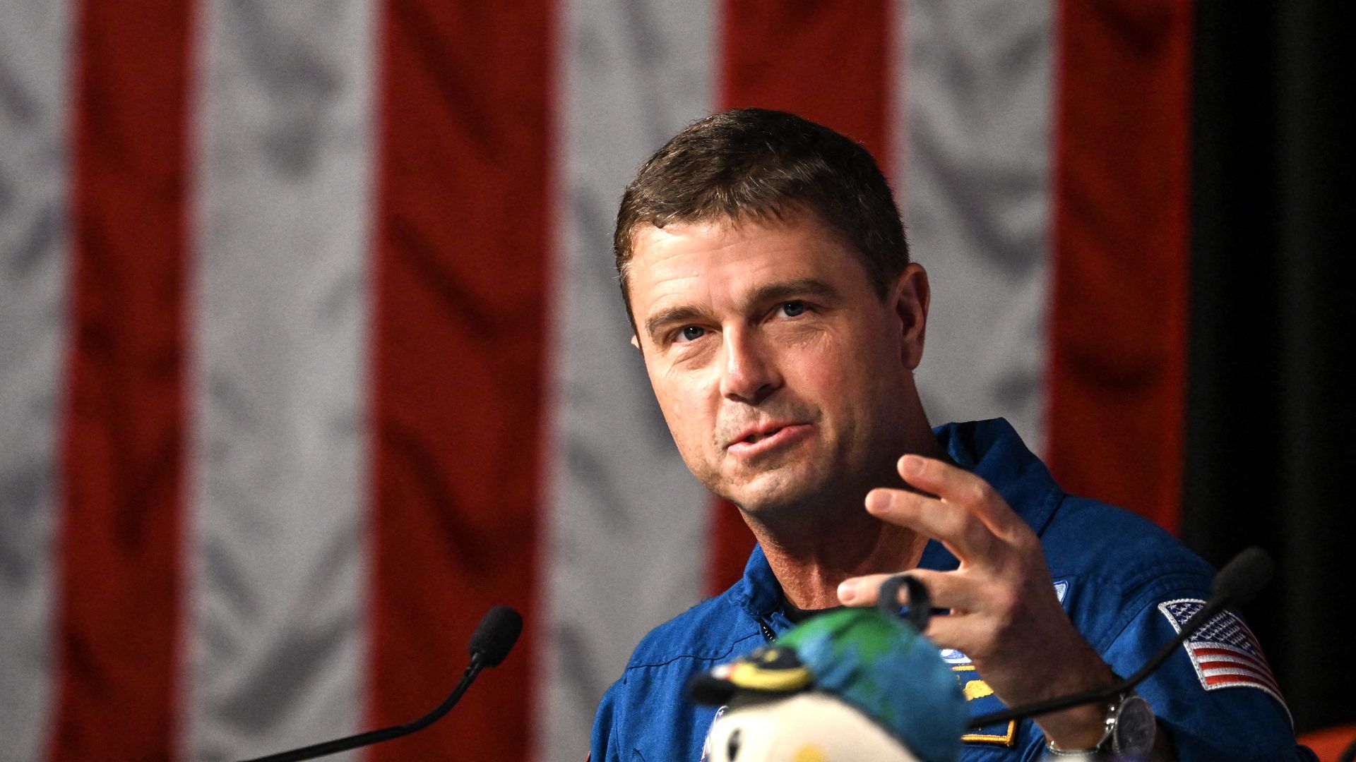 Artemis II Commander Reid Wiseman speaks on Thursday in Houston