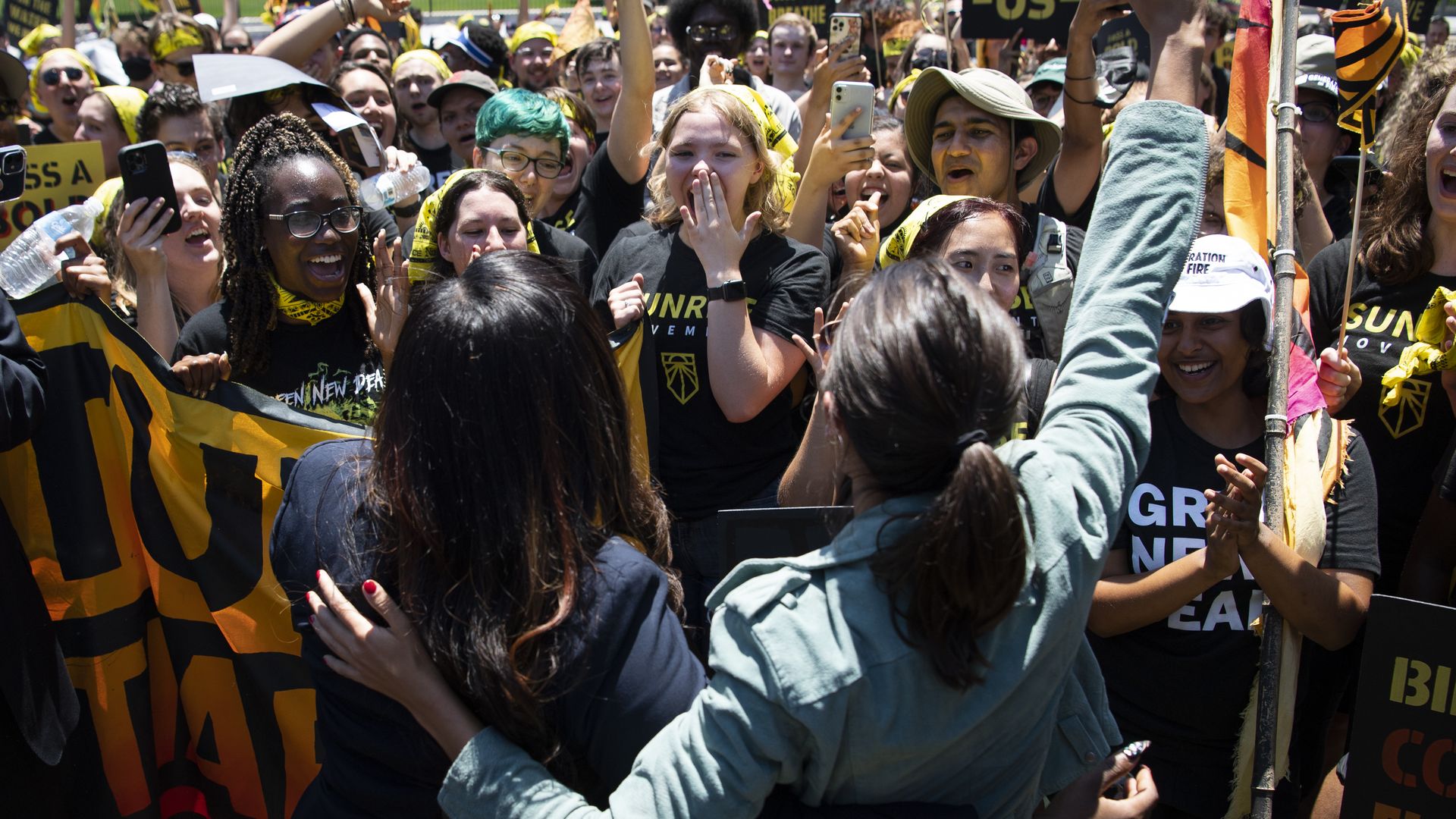 Rep. Alexandria Ocasio-Cortez, D-N.Y., and Rep. Cori Bush, D-Mo., attend a "No Climate, No Deal" rally in Lafayette Square in Washington on Monday, June 28, 2021.