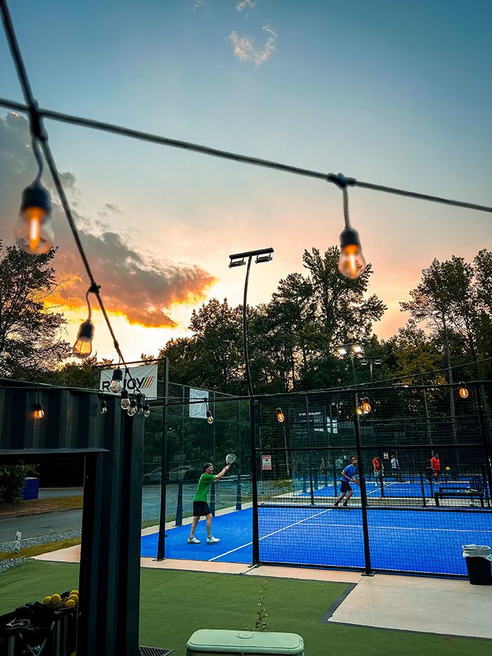 Charlotte Padel Club courts at sunset. 
