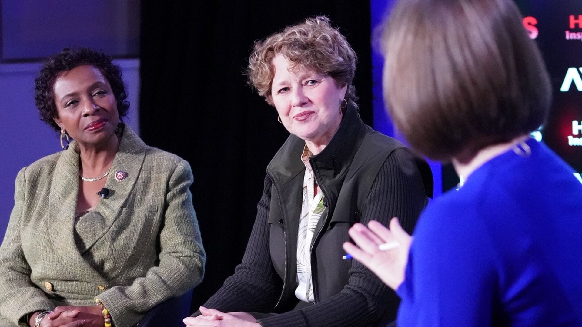 (Left) Rep. Yvette Clark, (Center) Rep. Susan Brooks, (Right) Kim Hart on the Axios stage. 