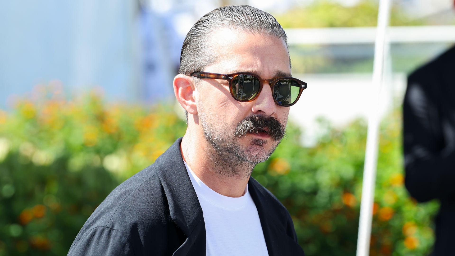 Photo shows Shia LeBeouf with sunglasses.