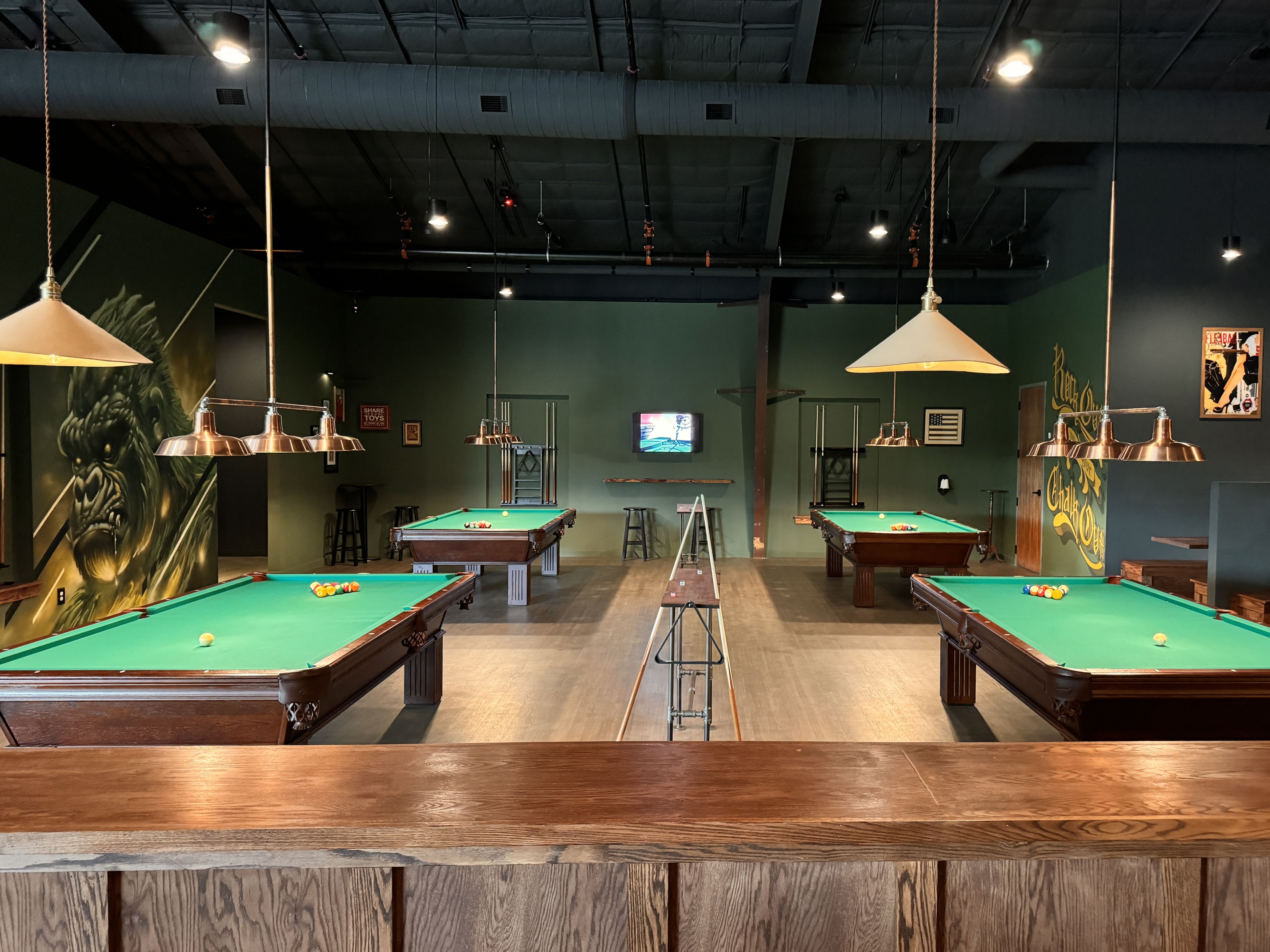 four pool tables