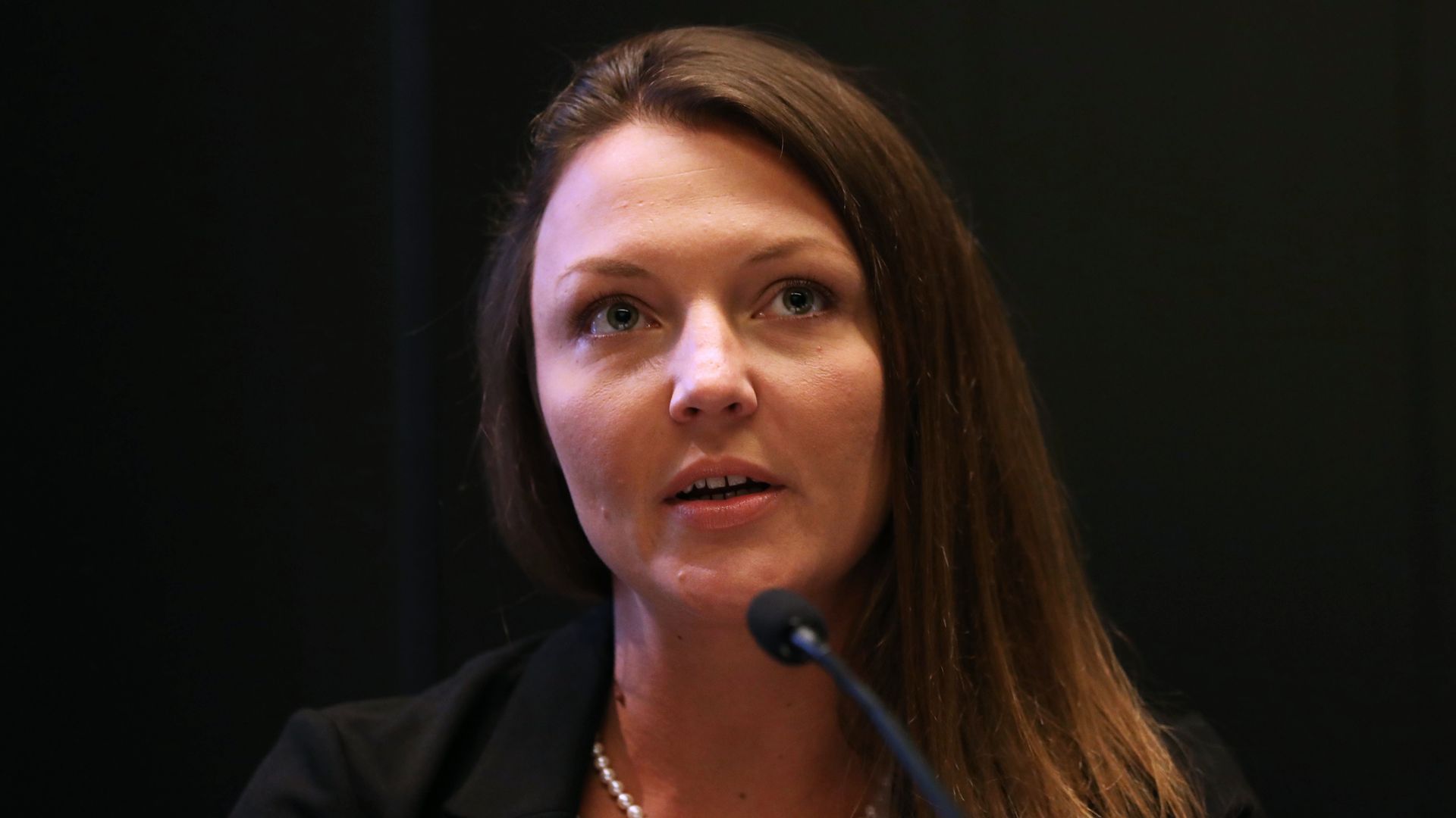 Courtney Wild, who claims she was abused by Jeffrey Epstein when she was a minor, speaks at a news conference
