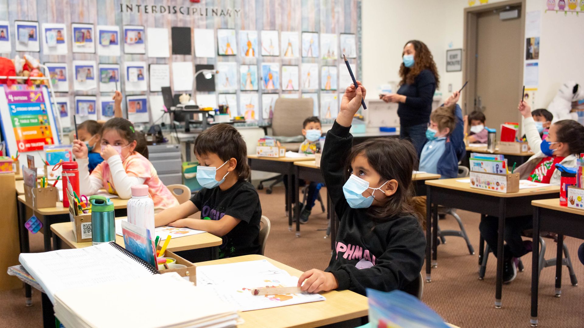 Students in Isabel Reyes kindergarten class at Stanley Mosk Elementary school wear masks while indoors Friday, March 11, 2022.