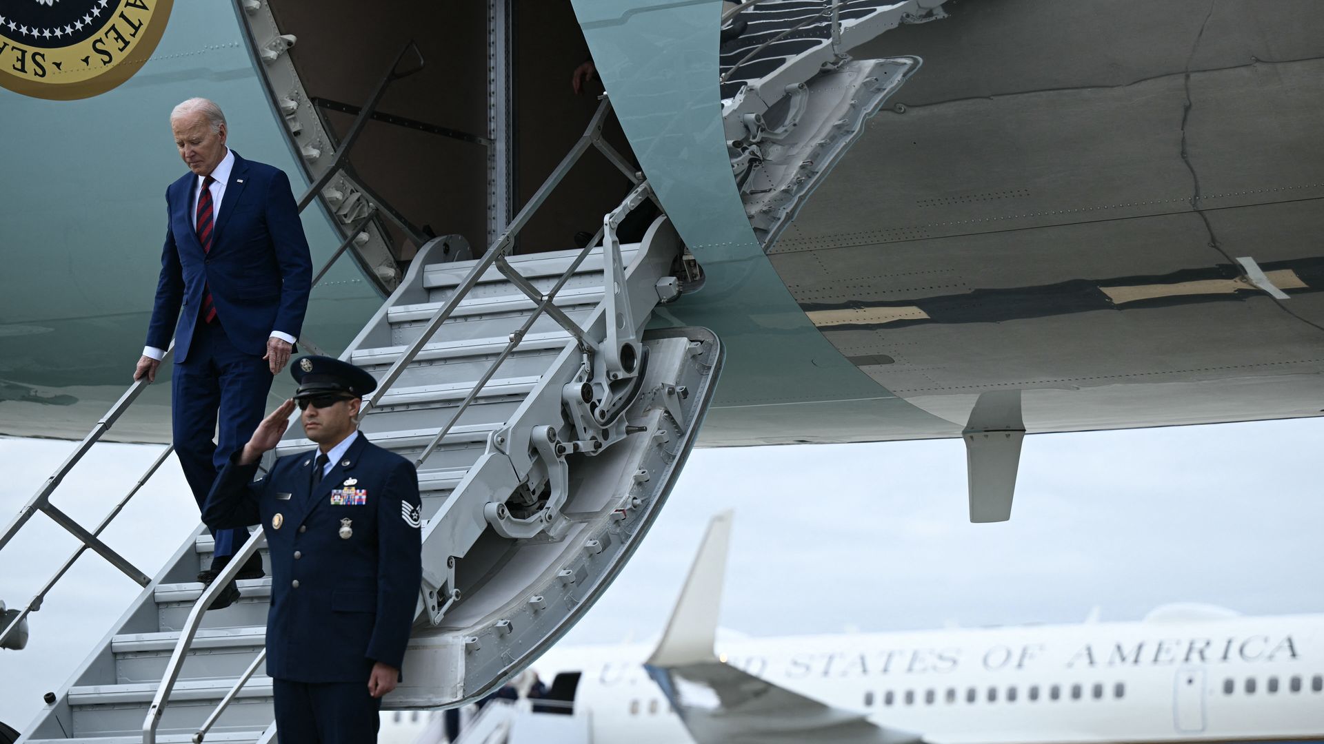 US President Joe Biden exits Air Force One upon arrival at Raleigh-Durham International Airport in Raleigh, North Carolina, on March 26, 2024. (Photo by Brendan SMIALOWSKI / AFP) (Photo by BRENDAN SMIALOWSKI/AFP via Getty Images)