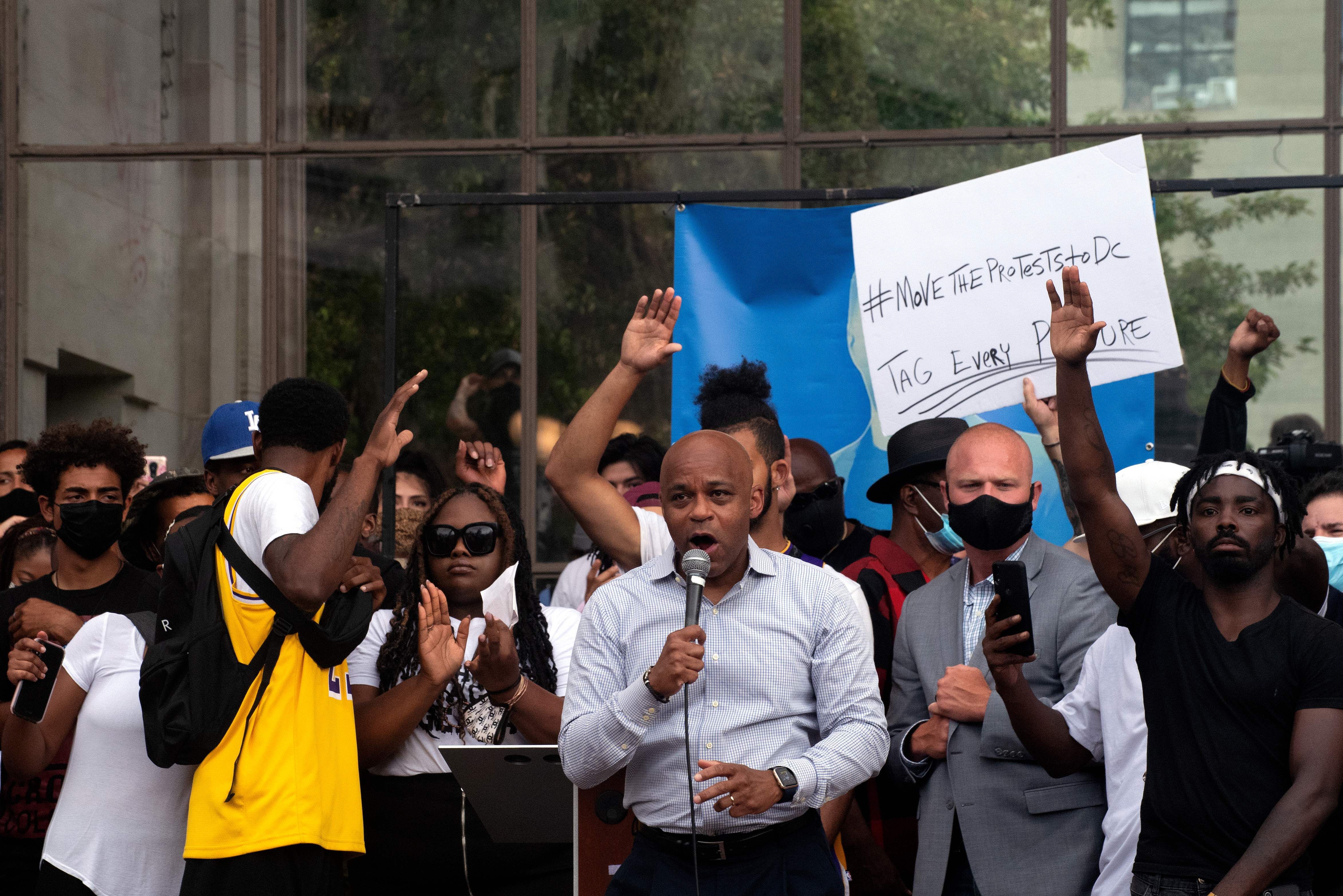 Denver Mayor Michael Hancock addresses demonstrators gathered at Civic Center Park in Denver, Colorado on June 3, 2020, who are protesting the death of George Floyd, an unarmed black man who died while while being arrested and pinned to the ground by the knee of a Minneapolis police officer. - US protesters welcomed new charges brought Wednesday against Minneapolis officers in the killing of African American man George Floyd -- but thousands still marched in cities across the country for a ninth straight night, chanting against racism and police brutality. (Photo by Jason Connolly / AFP) (Photo by JASON CONNOLLY/AFP via Getty Images)