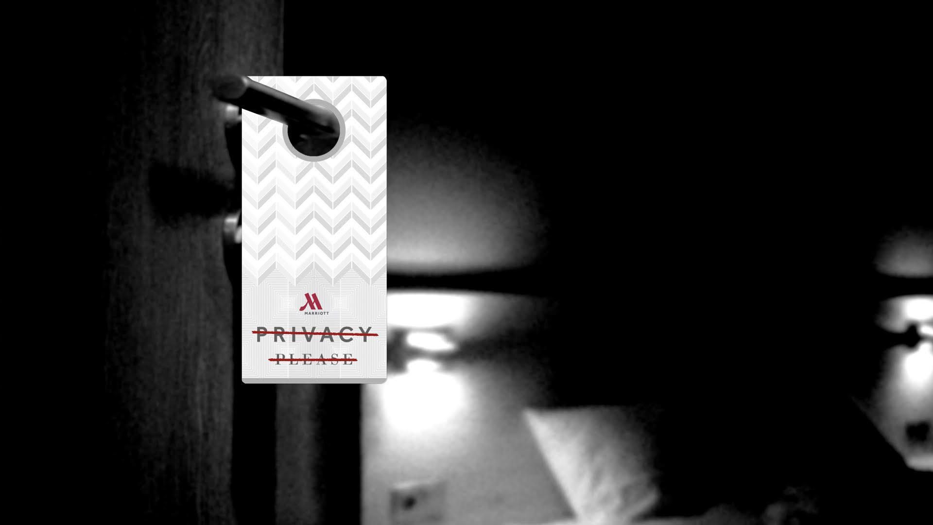 Illustration of a Marriott privacy please door hanger with the words crossed out