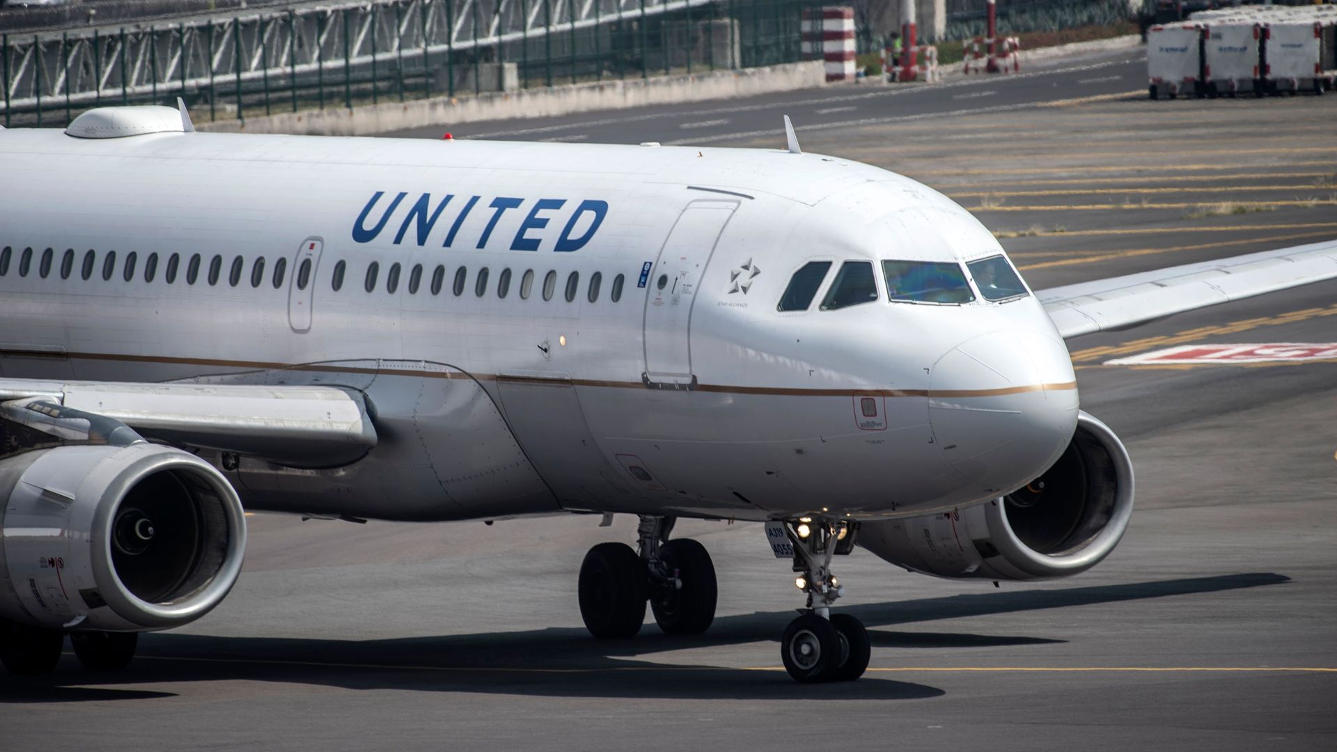 Image of a United Airlines jet on the runway