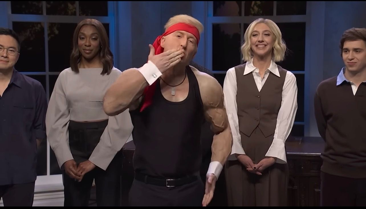 SNL actor portraying Trump blows a kiss