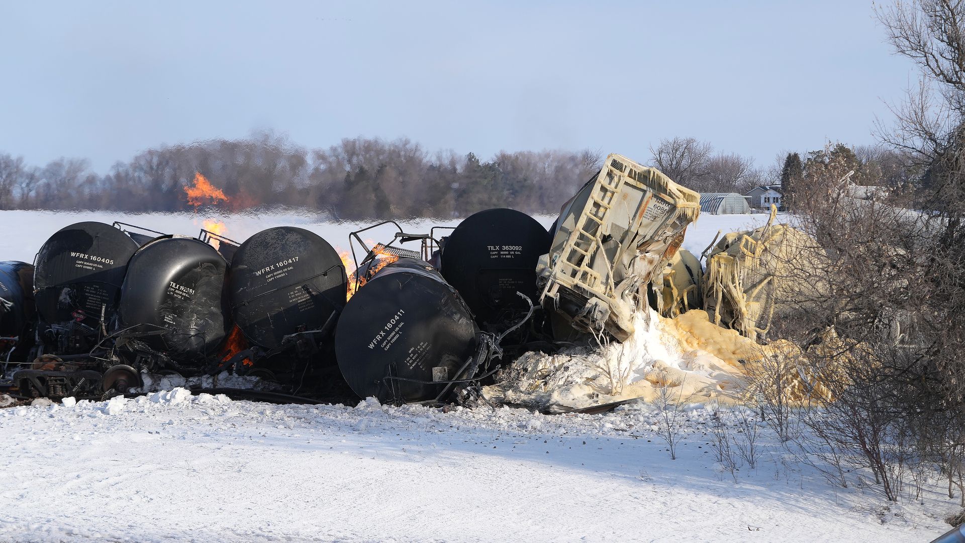 Flaming tanker cars from a BNSF train carrying ethanol and corn syrup that derailed in the town of Raymond, Minnesota, on March 30.