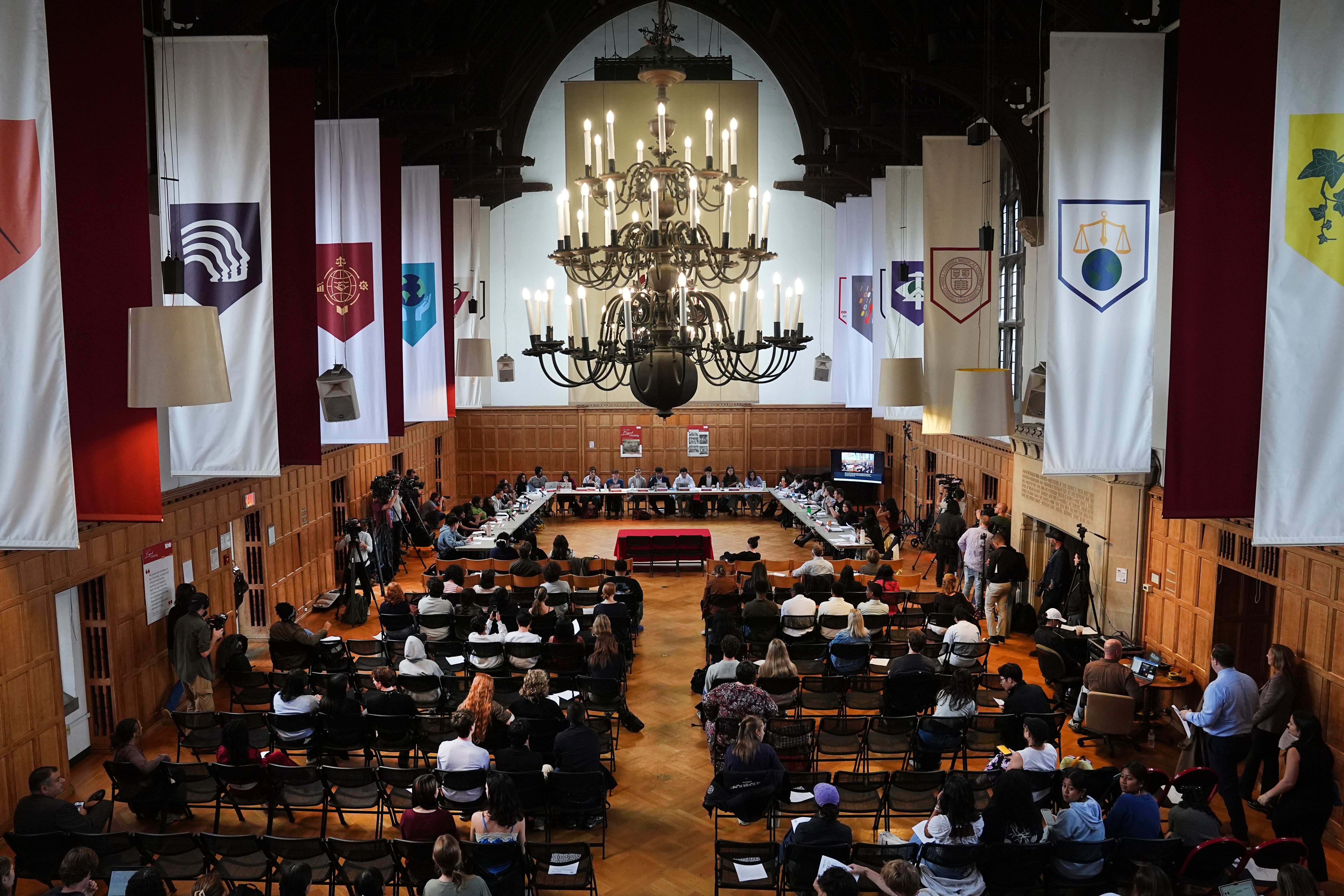 People gather prior to a hearing on sexual assault on campus at Cornell University in Ithaca, N.Y., Thursday, Oct. 1, 2026. (AP Photo/Matt Rourke)
