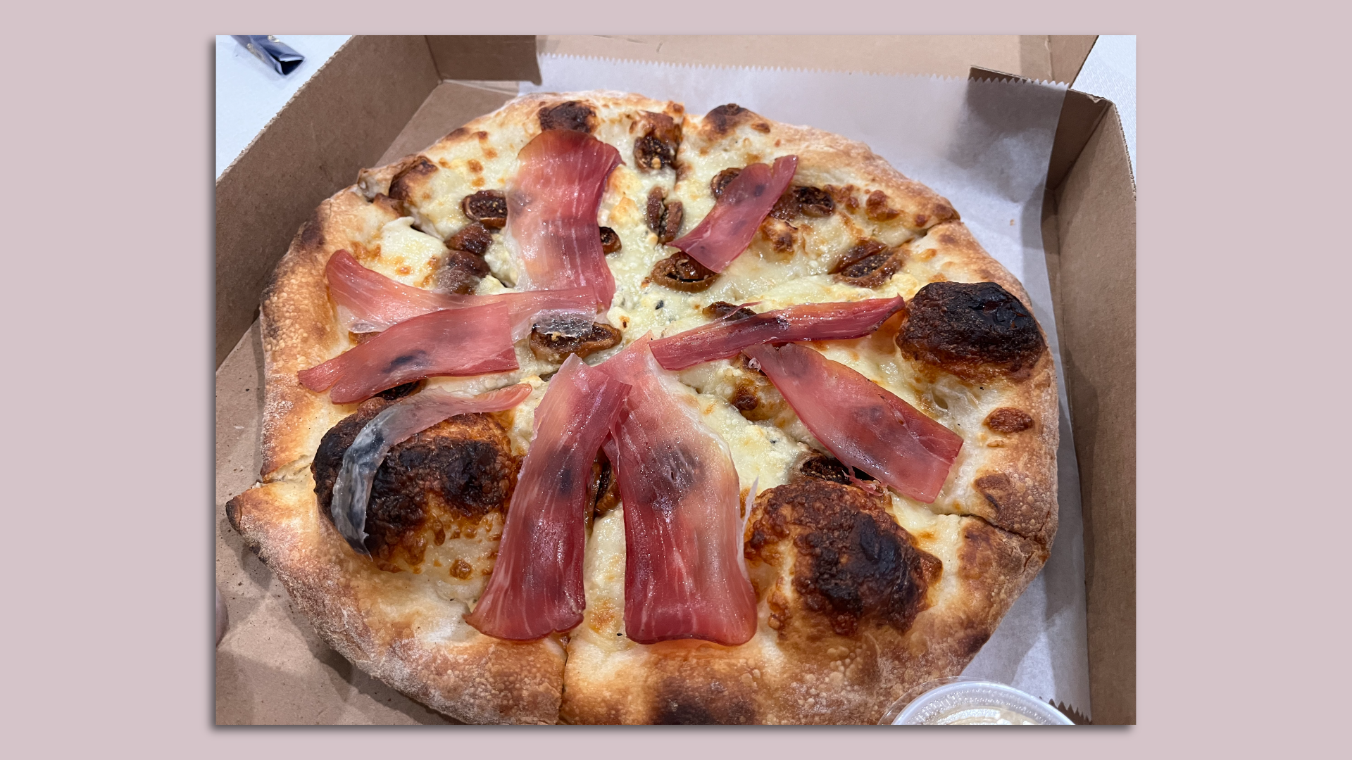 A Crust Pizza with proscuitto, figs and blue cheese.