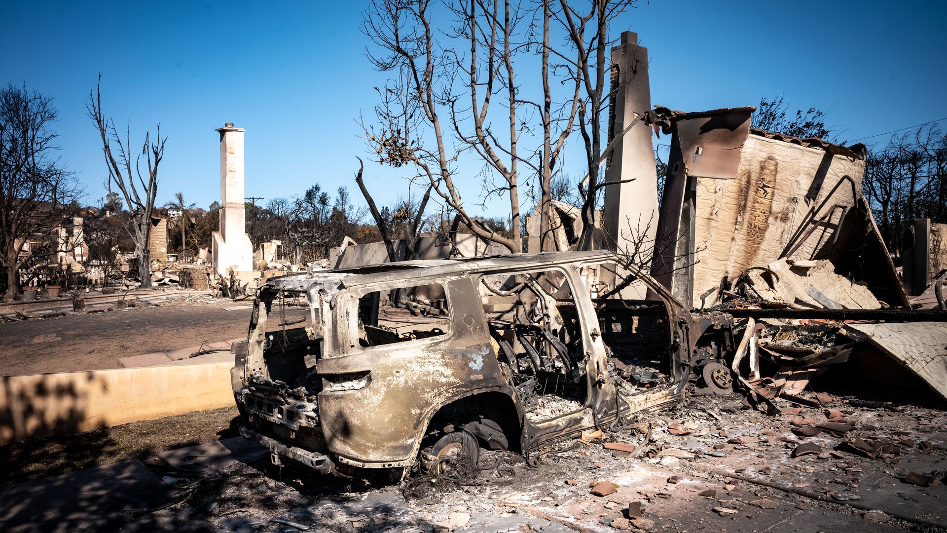 Homes destroyed by the Palisades Fire along Fiske Street in Pacific Palisades on Monday, January 13, 2025