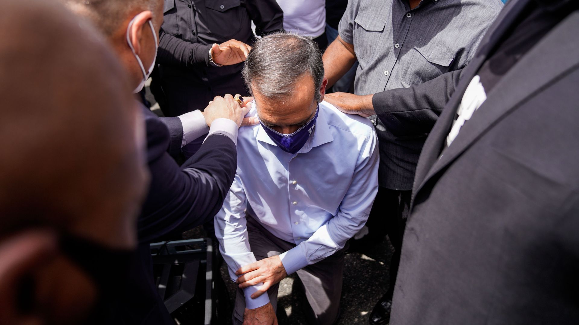 LA Mayor Eric Garcetti walks out to address protesters and clergy members from the Los Angeles area that are participating in a march and peaceful protest
