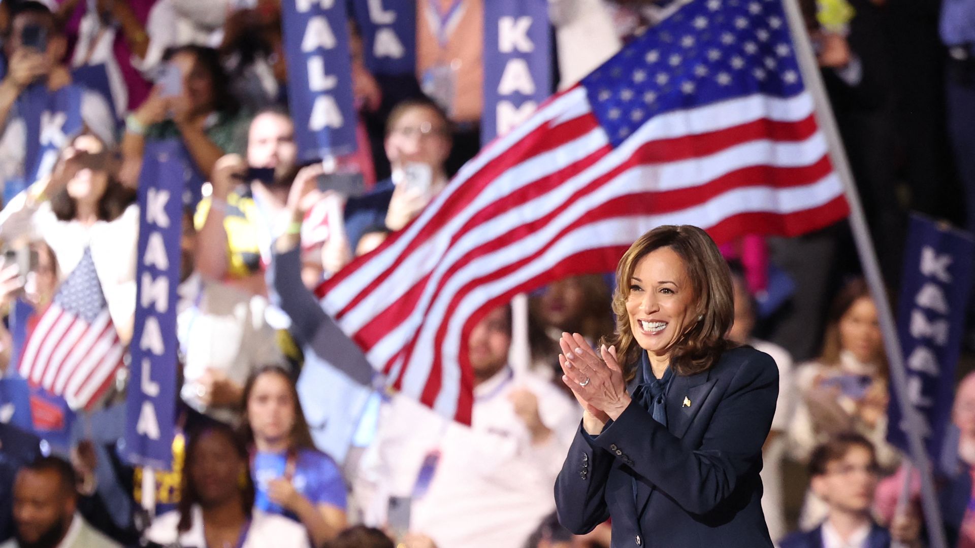 Vice President and 2024 Democratic presidential candidate Kamala Harris waves as she leaves the stage on the fourth and last day of the Democratic National Convention (DNC) at the United Center in Chicago on August 22, 2024.