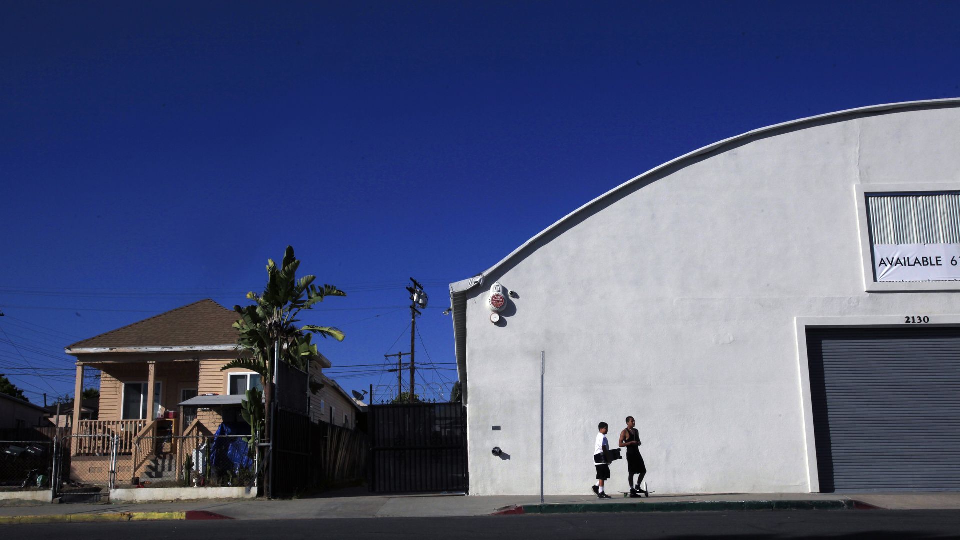 A home next to a warehouse in Barrio Logan