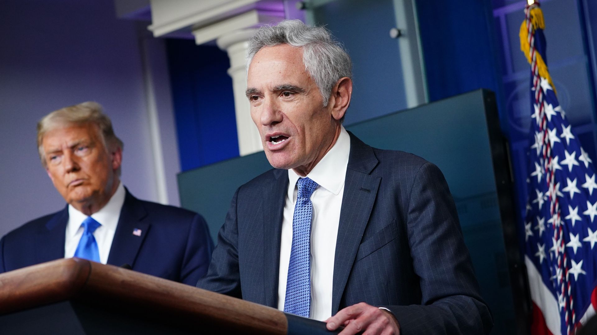 Former White House coronavirus adviser Scott Atlas speaks at a press conference in September 2020 as former President Trump looks on.