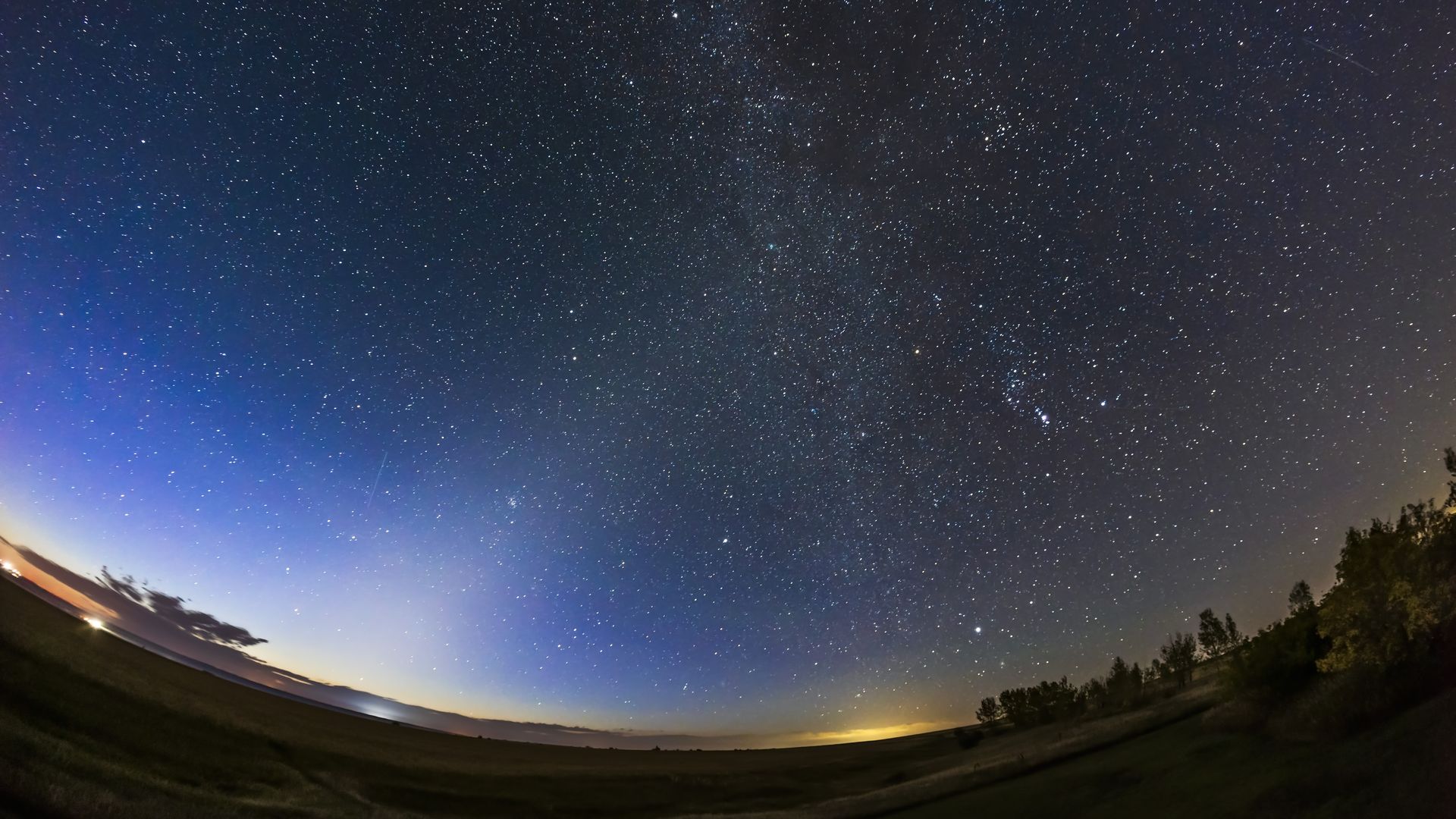 The Zodiacal Light appears as a pyramid shape in the dawn sky. 