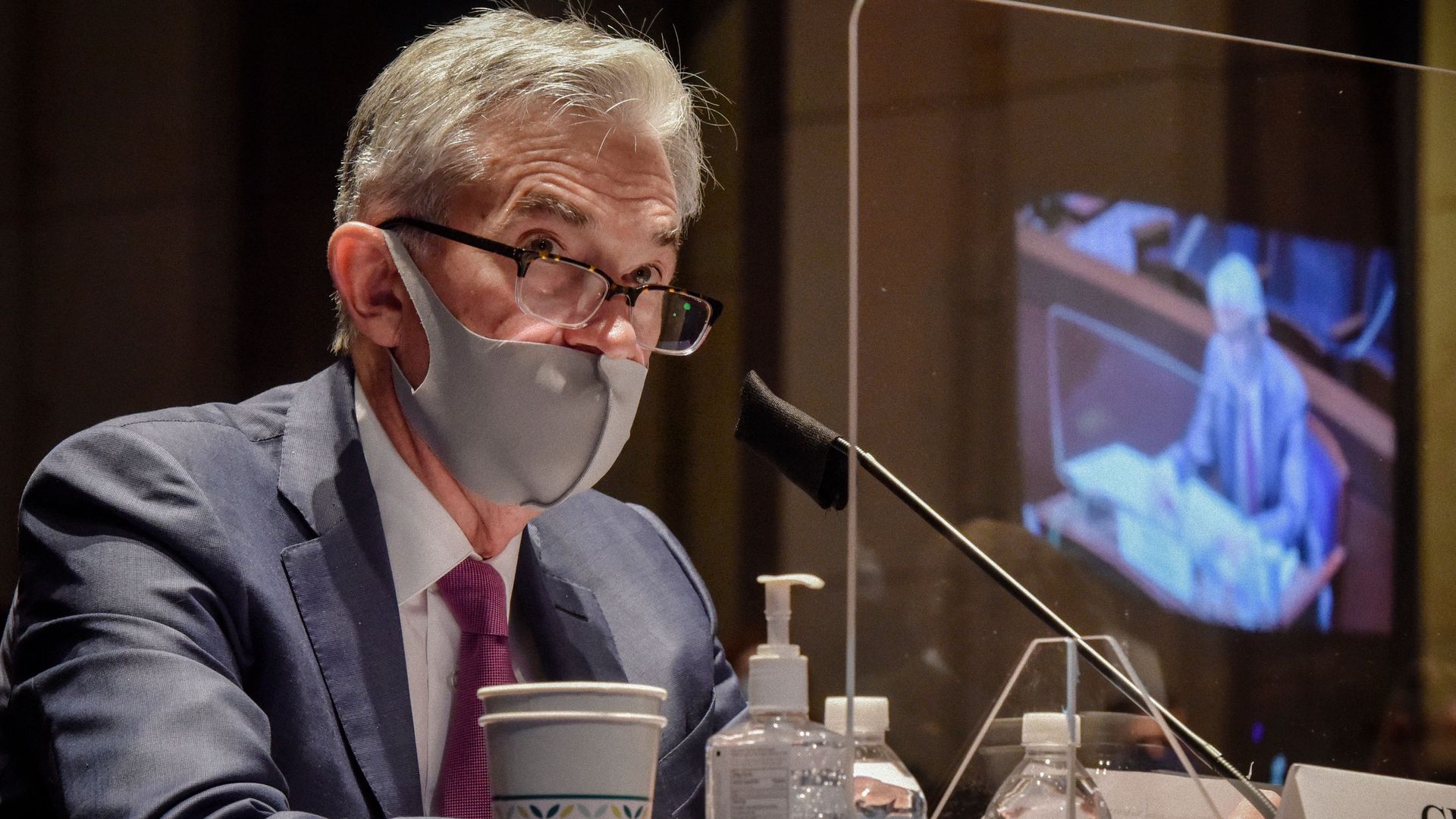 Fed chairman Jerome Powell behind a plexiglass barrier during a Congressional testimony in June