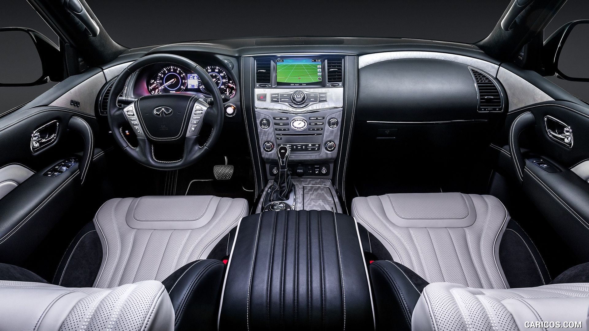 This image shows the black and gray interior of the Infiniti QX80. 