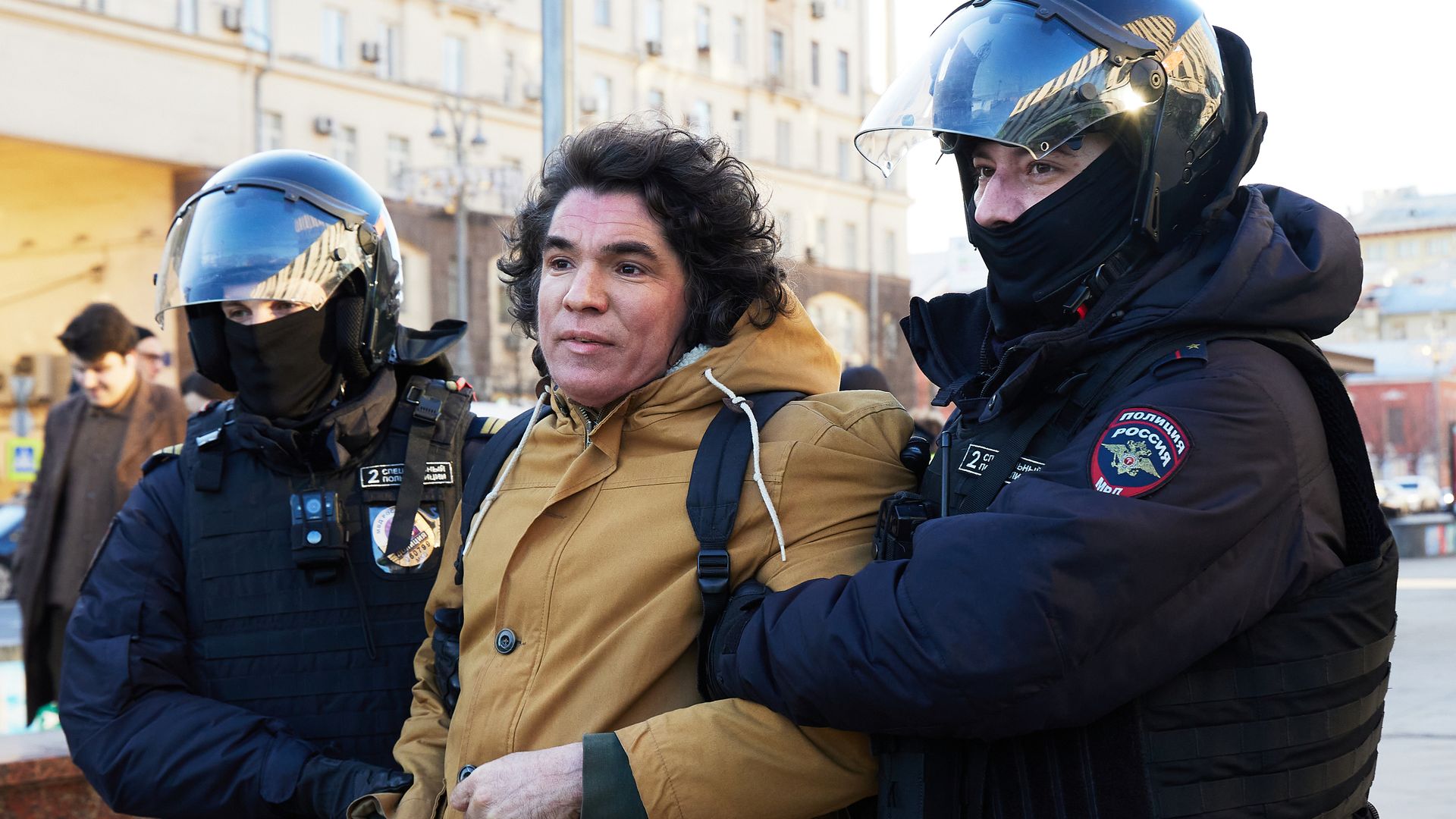 Police officers detain a man during a protest against Russia's invasion of Ukraine at Pushkinskaya square on February 27, 2022 in Moscow, Russia.