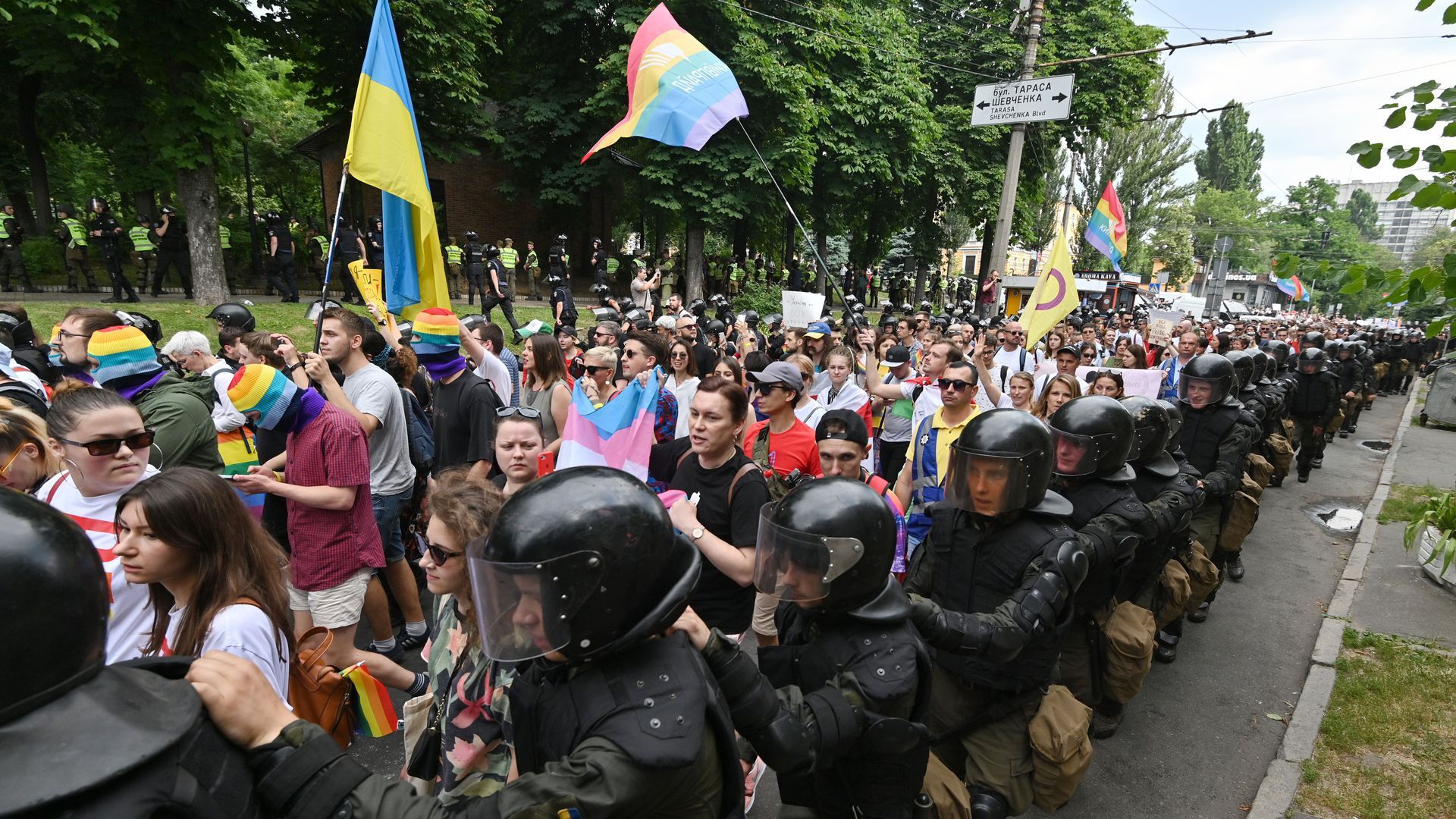 The Ukrainian National Guard escorts pride parade participants in Kiev. 