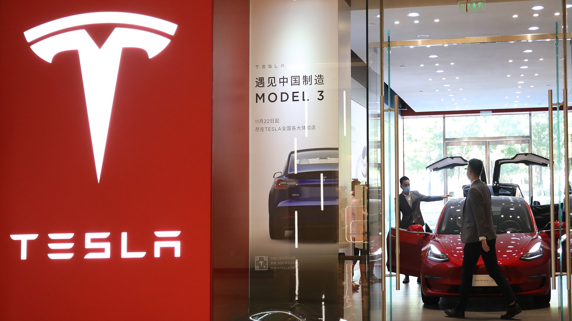 A Tesla 3 electric vehicle displayed in a showroom in Beijing, China