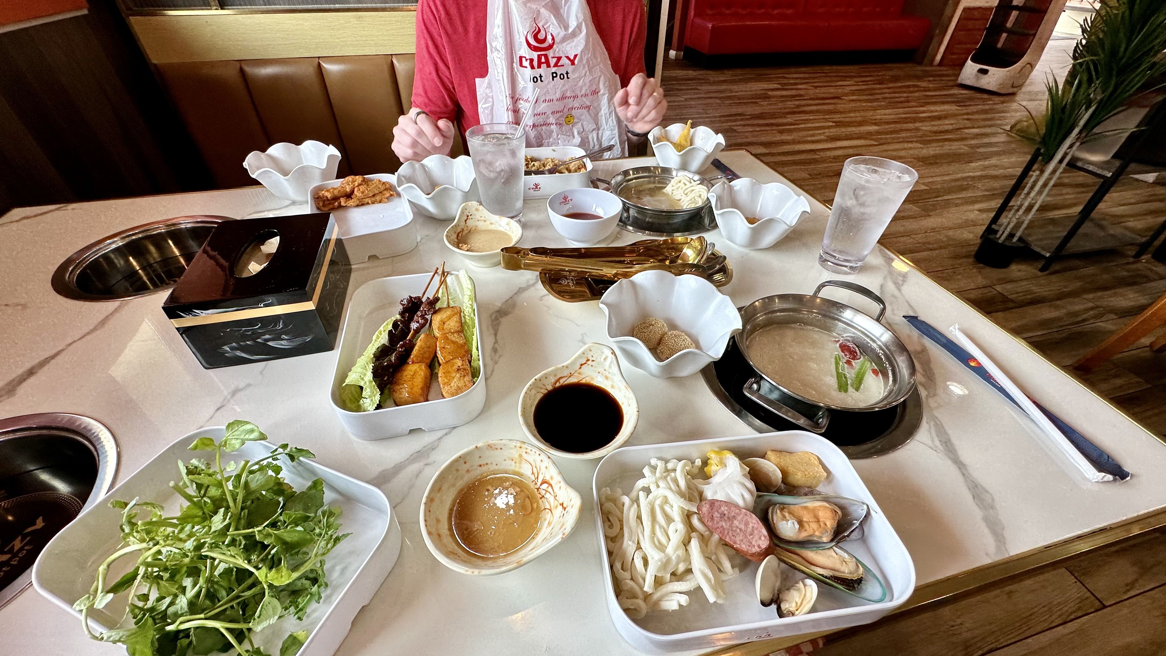 Photo shows a table of food.