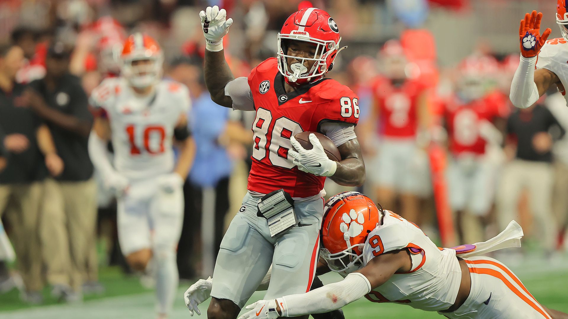 ATLANTA, GA - AUGUST 31: Clemson Tigers safety R.J. Mickens (9) tackles Georgia Bulldogs wide receiver Dillon Bell (86) during the Saturday afternoon college football game between the University of Georgia Bulldogs and the Clemson Tigers on 08/31/2024 at the Mercedes-Benz Stadium in Atlanta, GA. (Ph