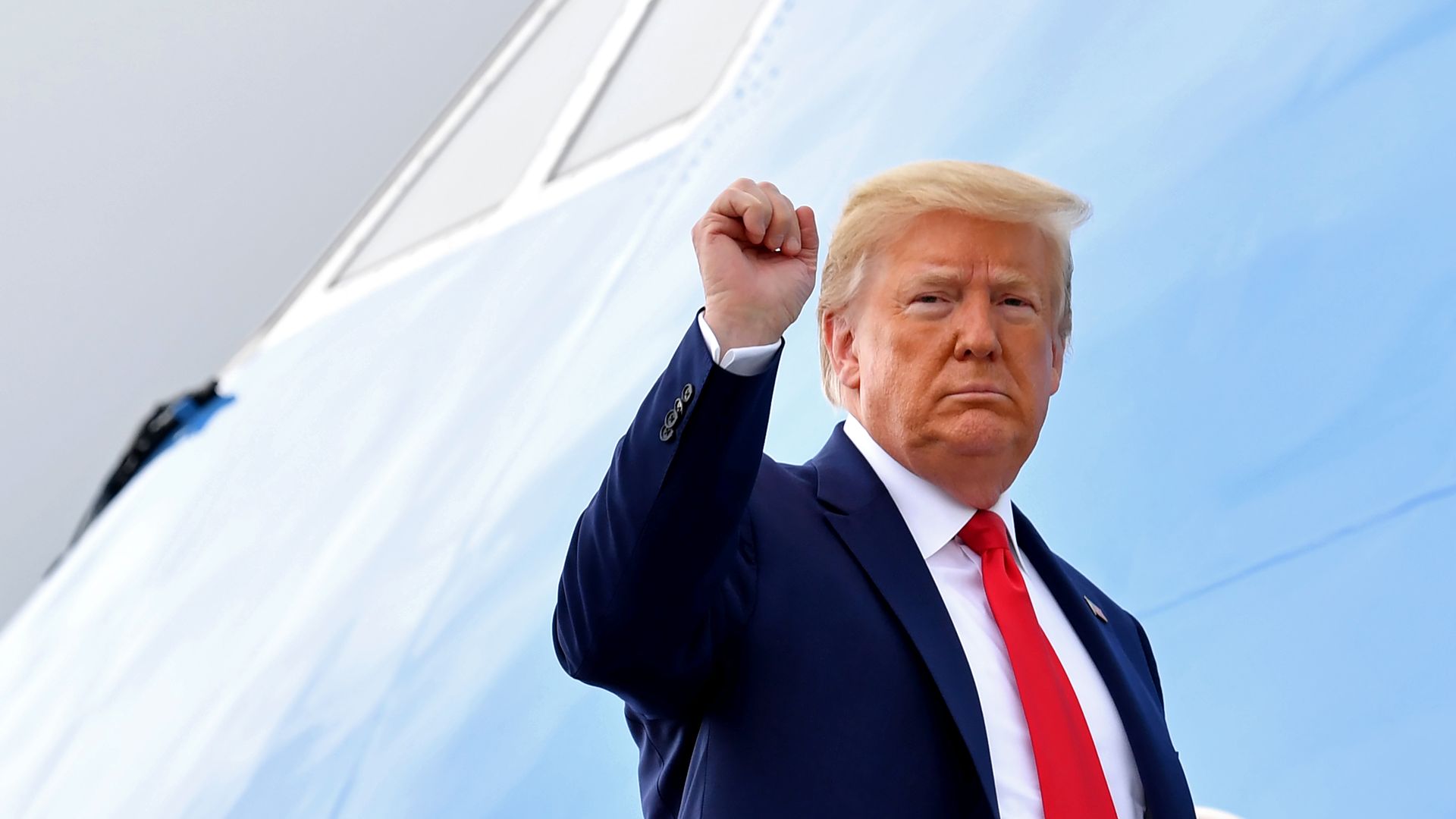 Donald Trump holding up a fist