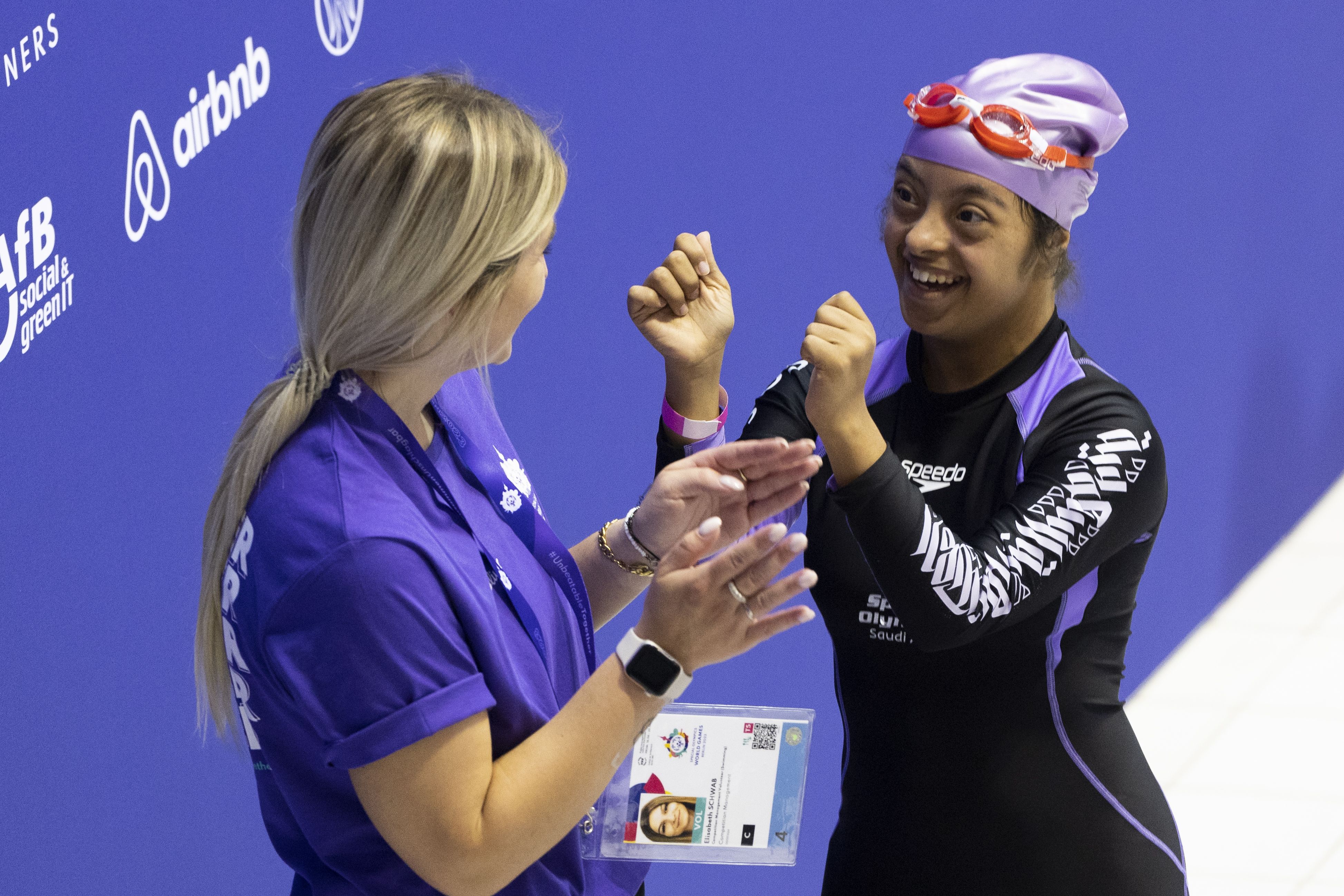 Sarah Ghandoura of Saudia Arabia interacts with volunteer prior the 100m Freestyle Level A Quarterfinal during day two of Special Olympics World Games.