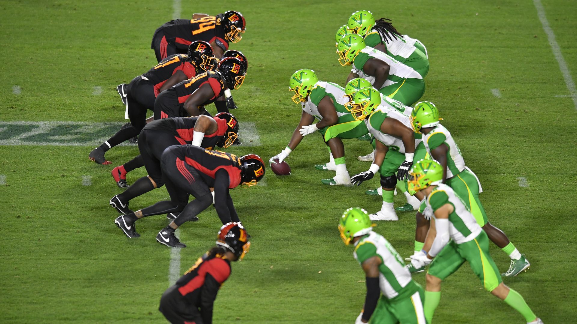 XFL players line up.