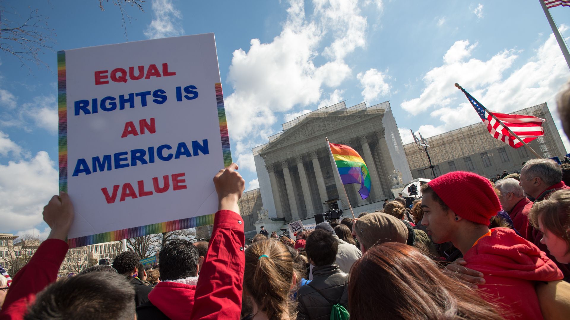 Supporters of LGBTQ rights rally outside the U.S. Supreme Court