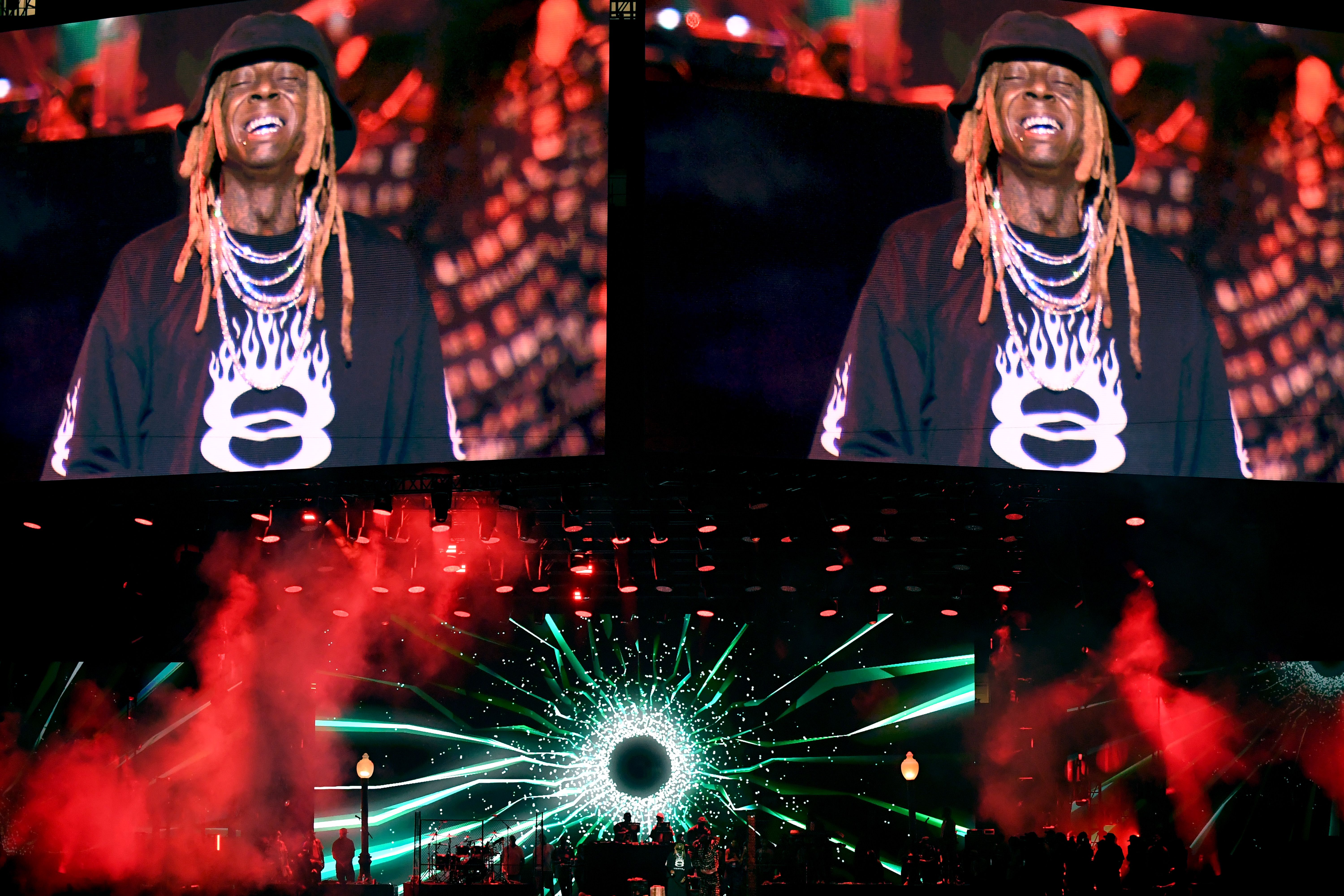 Photo shows Lil Wayne on stage.