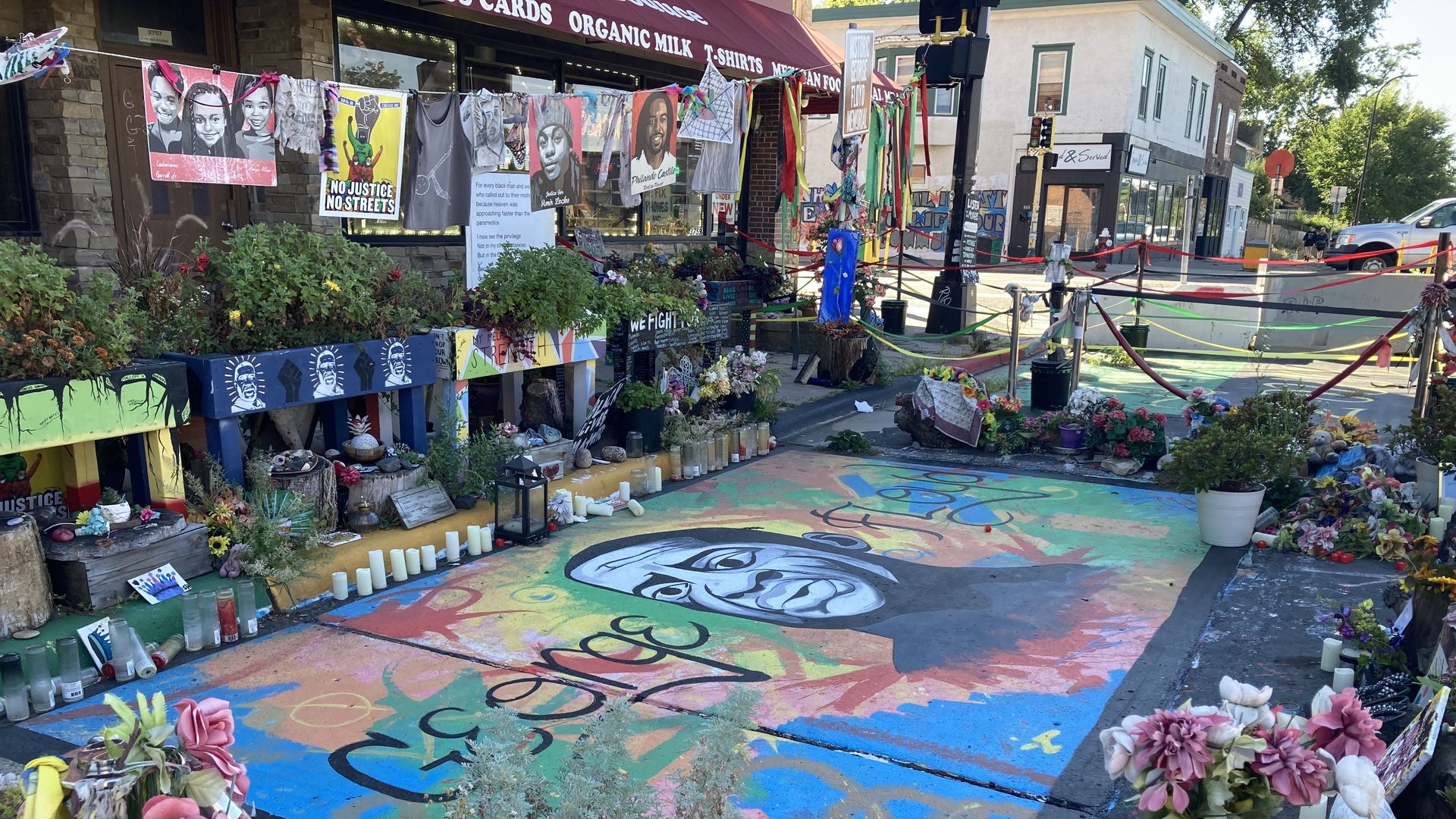 A street memorial to George Floyd remains carefully tended. 