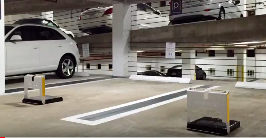 Screenshot from YouTube video of what the parking slot looks like with a block that goes up/down when reserved car arrives