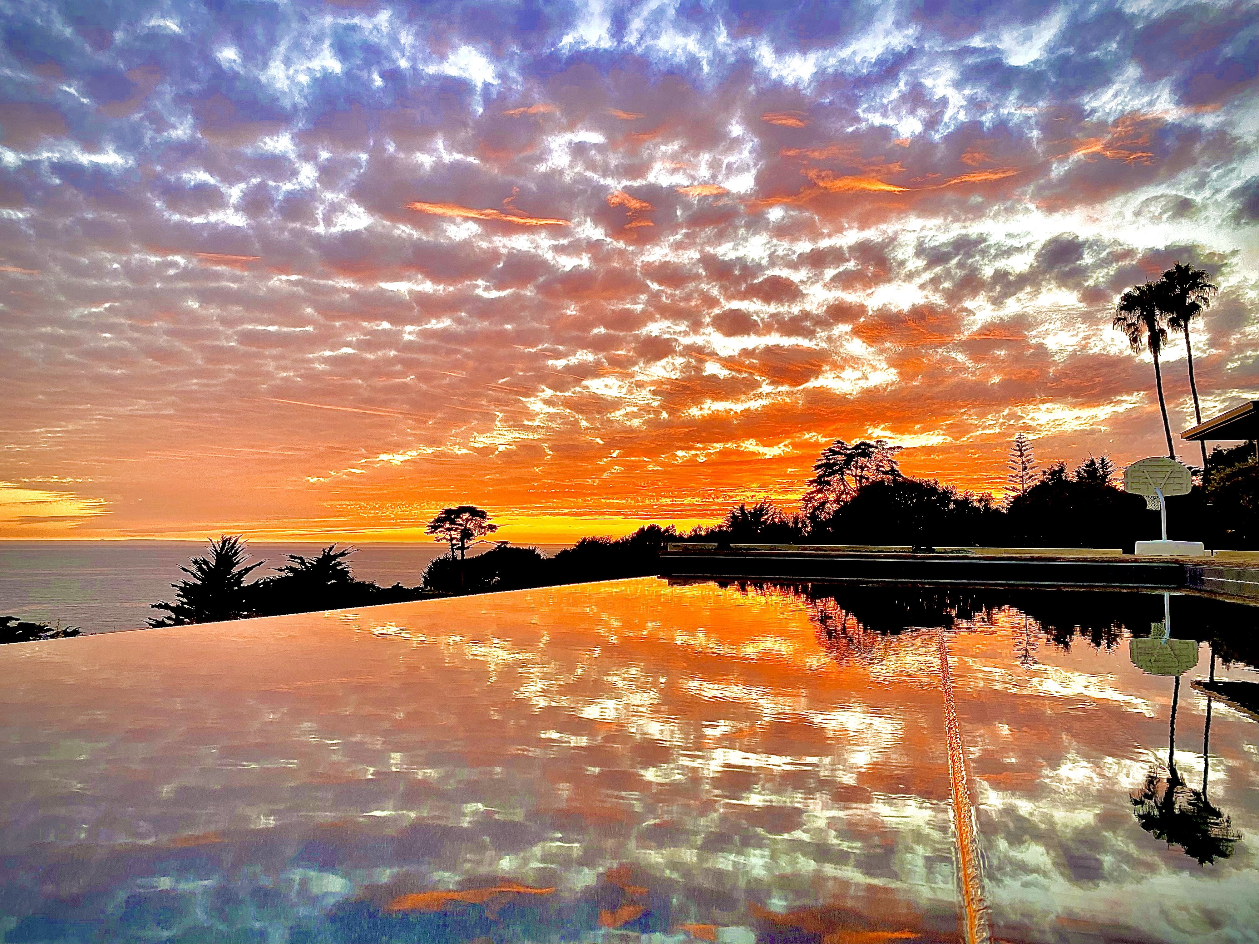 Sunset reflected in pool
