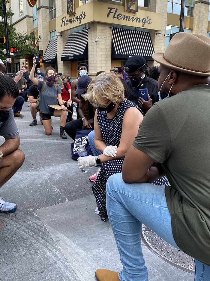Mayor Lyles kneeling with protesters